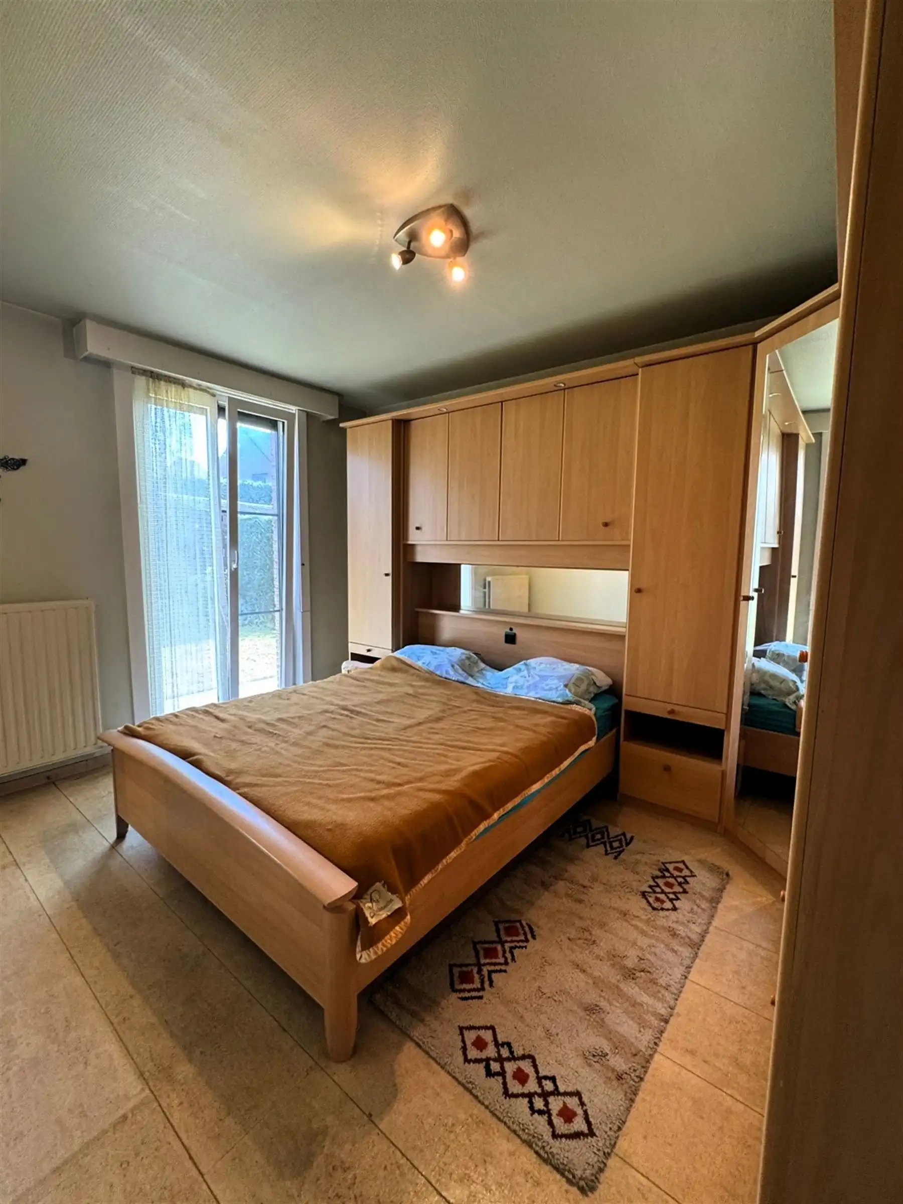 Gelijkvloerse woning met zonnige tuin in rustige woonbuurt foto 8