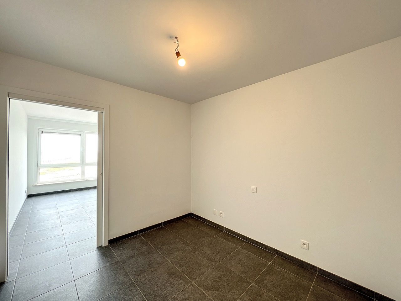 Studio met slaaphoek, gelegen op de Zeedijk foto 8