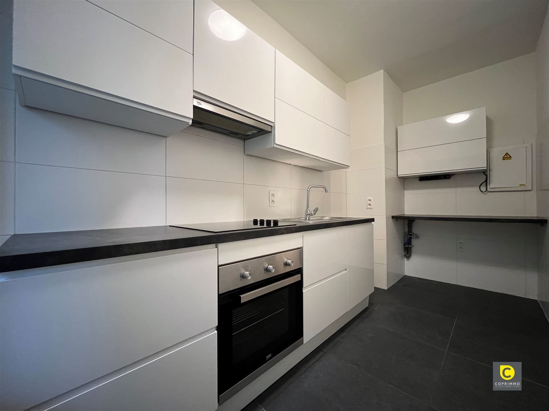 Instapklaar gelijkvloersappartement met 1 SLPK foto 3