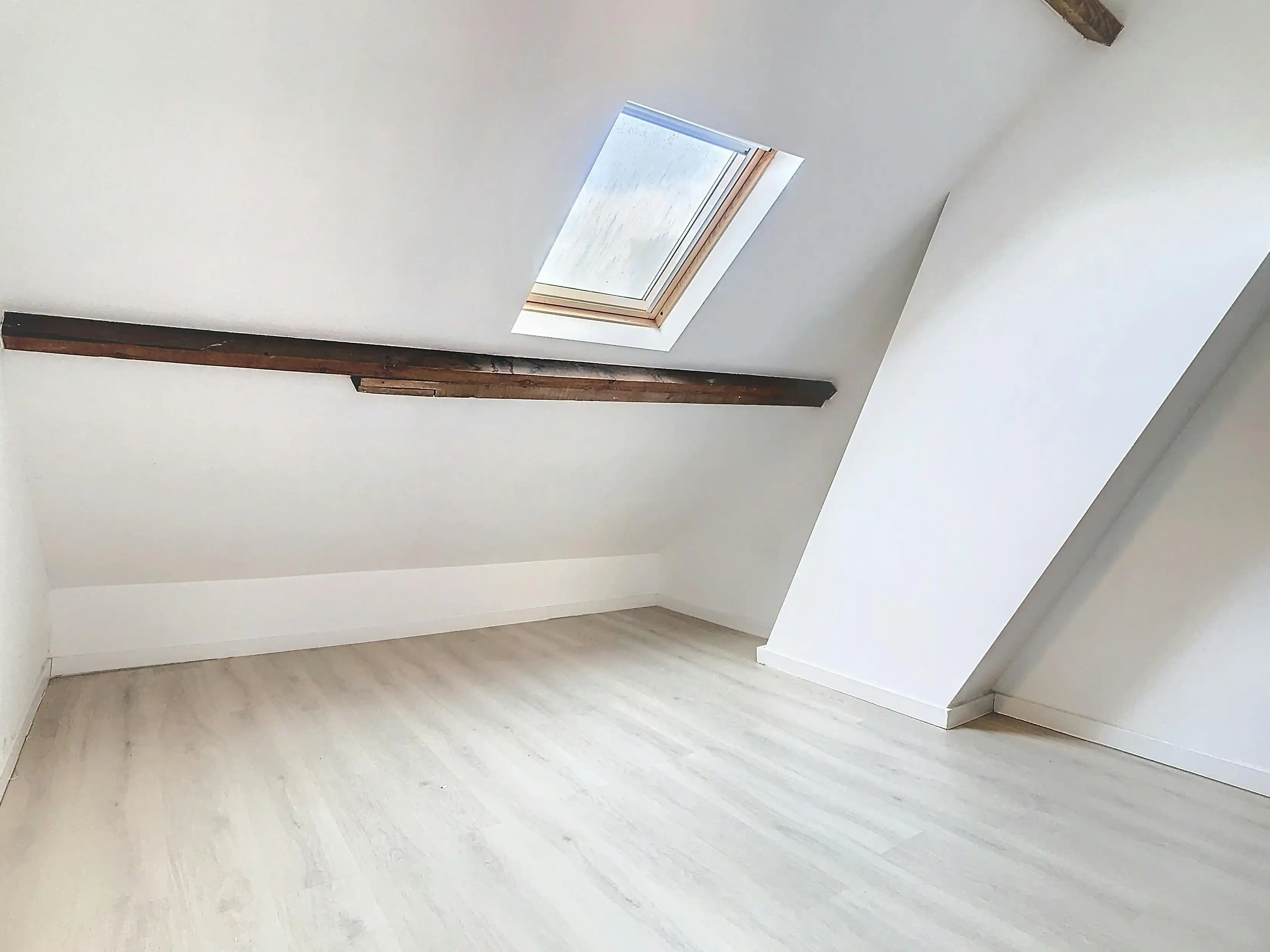 Instapklare rijwoning te koop met gezellige stadstuin  foto 11