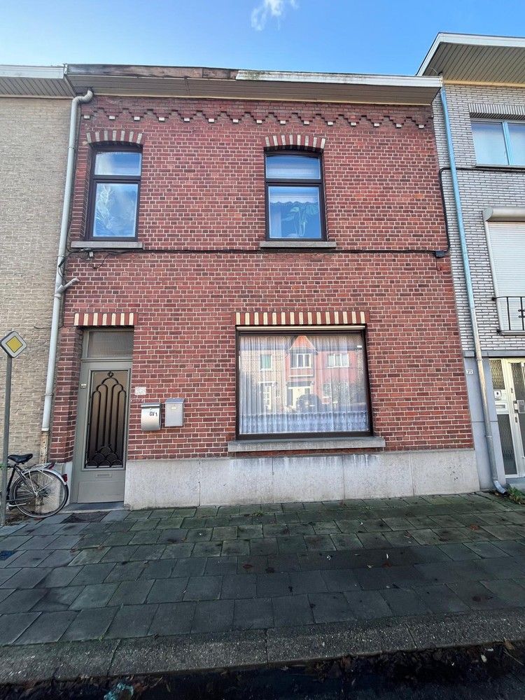 Hoofdfoto van de publicatie: Rijwoning opgesplitst in twee appartementen