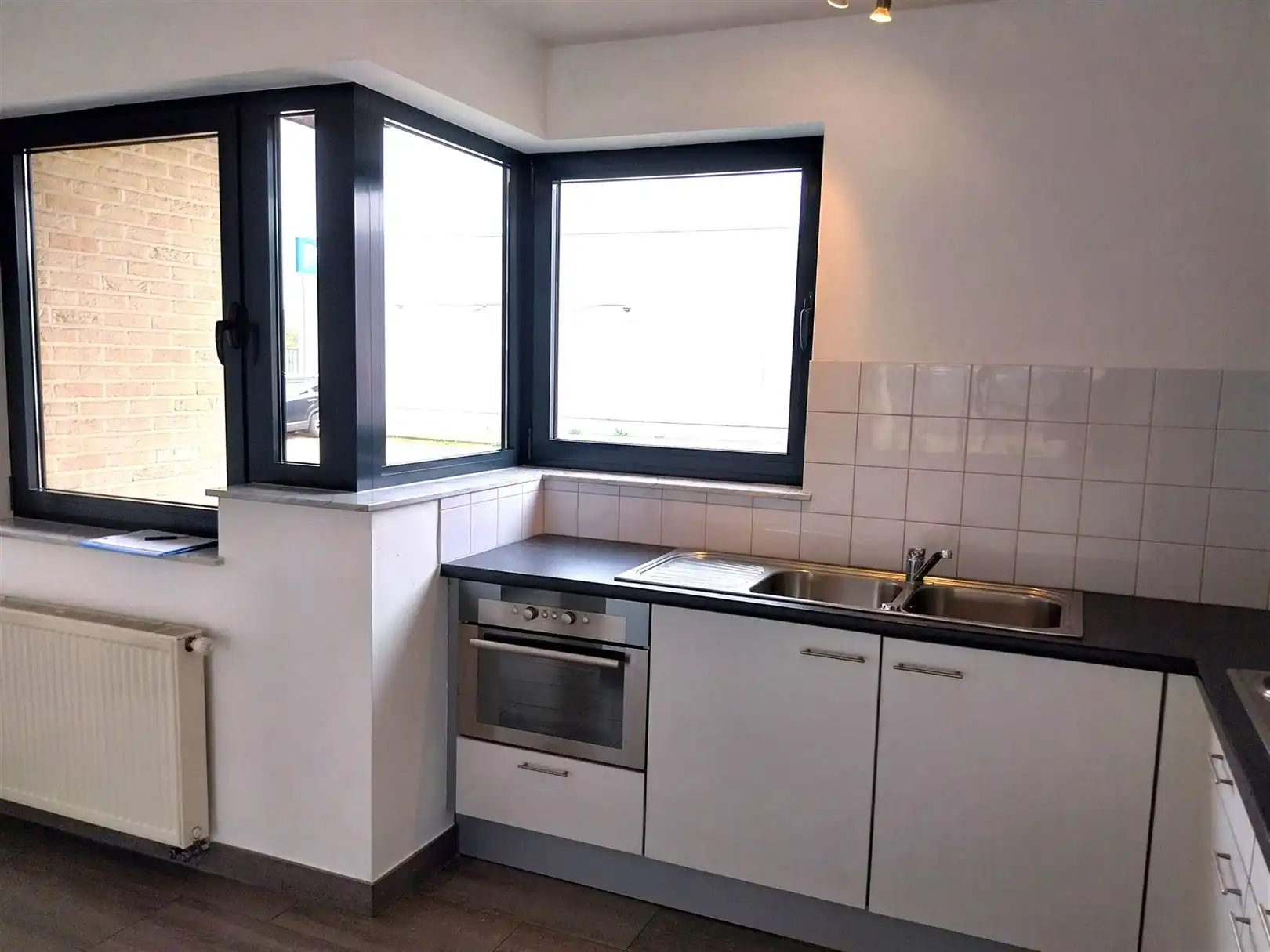 TE HUUR: Gelijkvloers appartement met 3 slaapkamers in Heusden-Zolder! foto 8