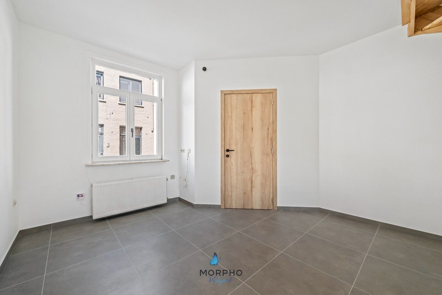 Instapklare stadswoning met tuin en achteruitgang op toplocatie in Sint-Gilliswijk (Brugge) foto {{pictureIndex}}