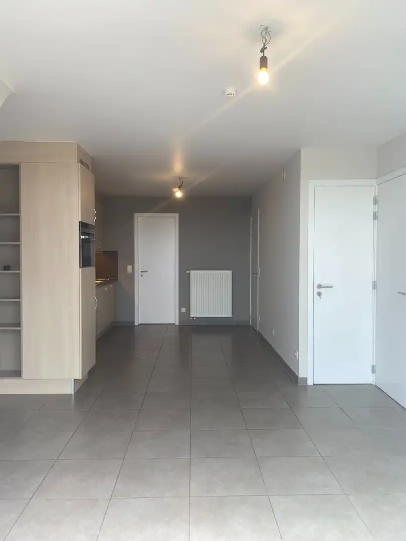 Verzorgd duplex-appartement met 3 slaapkamers en een autostaanplaats foto 3
