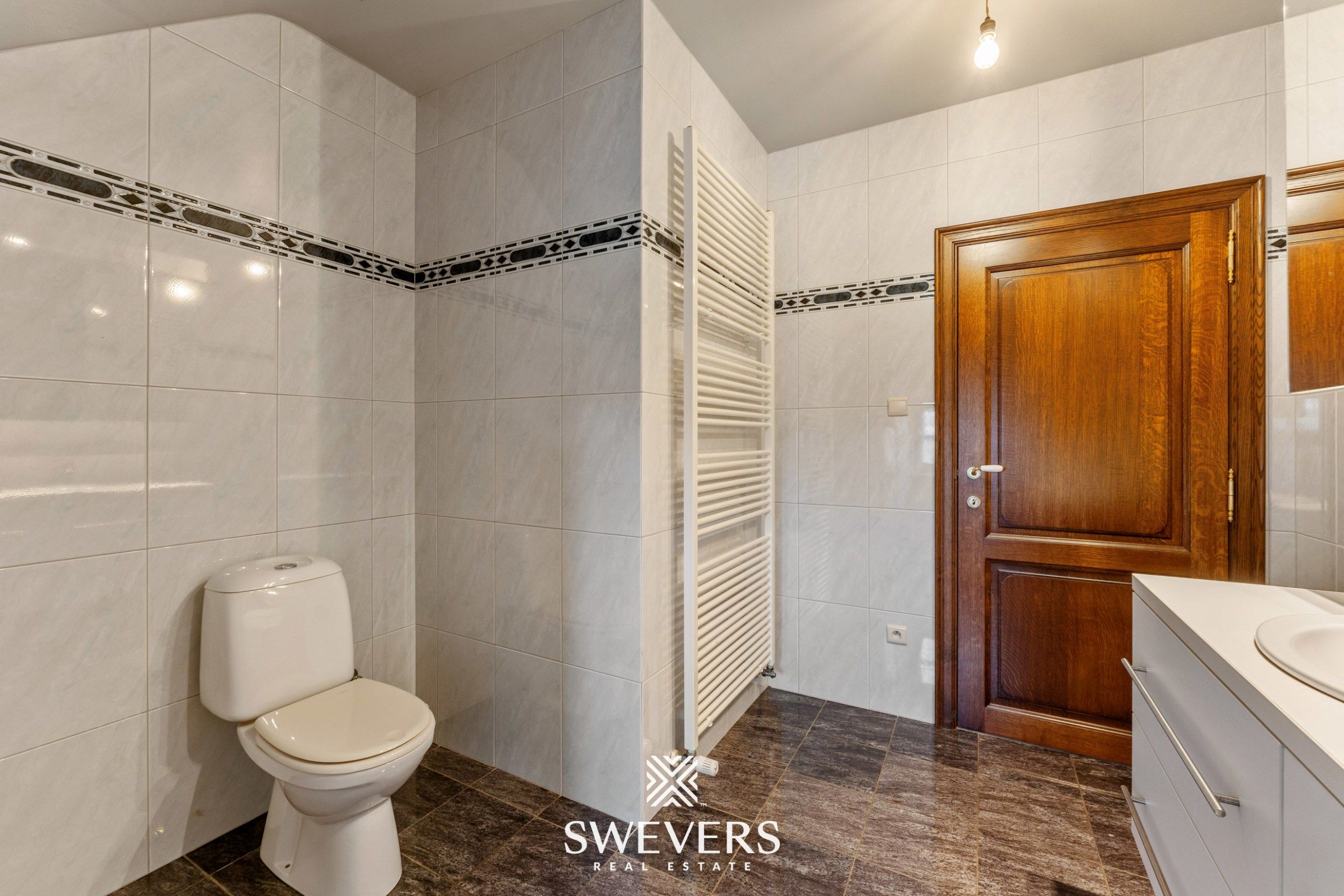 Ruime open bebouwing met 4 slaapkamers en zonnige tuin in Houthalen foto 28