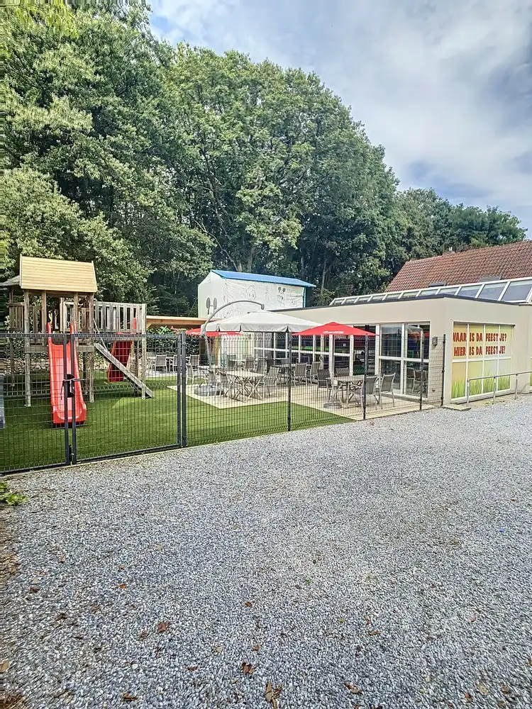 Ruime handelsruimte met woonst op zichtbare ligging in Koersel foto 3