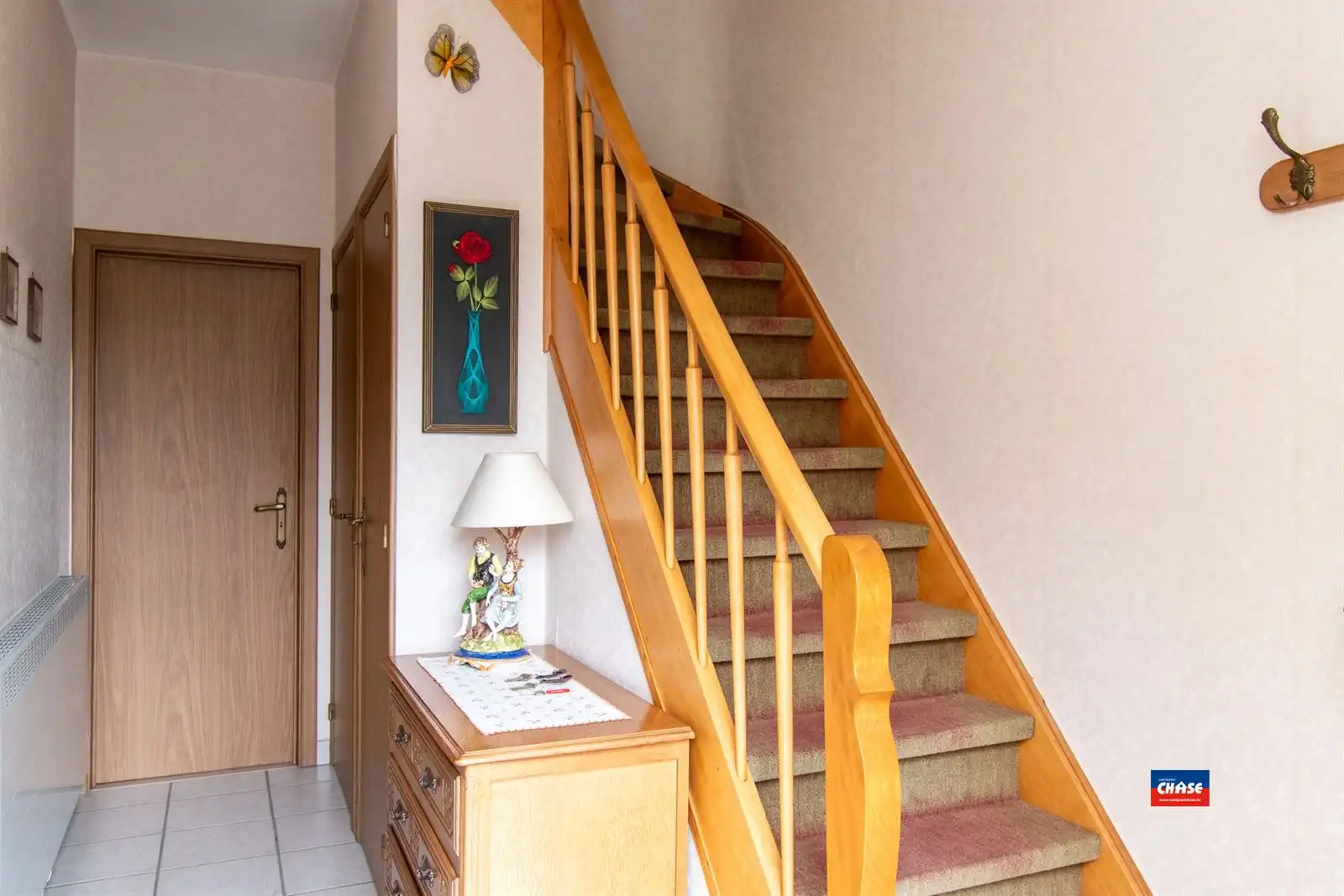 Halfopen bebouwing met 3 slaapkamers, tuin + 3 garageboxen foto 2