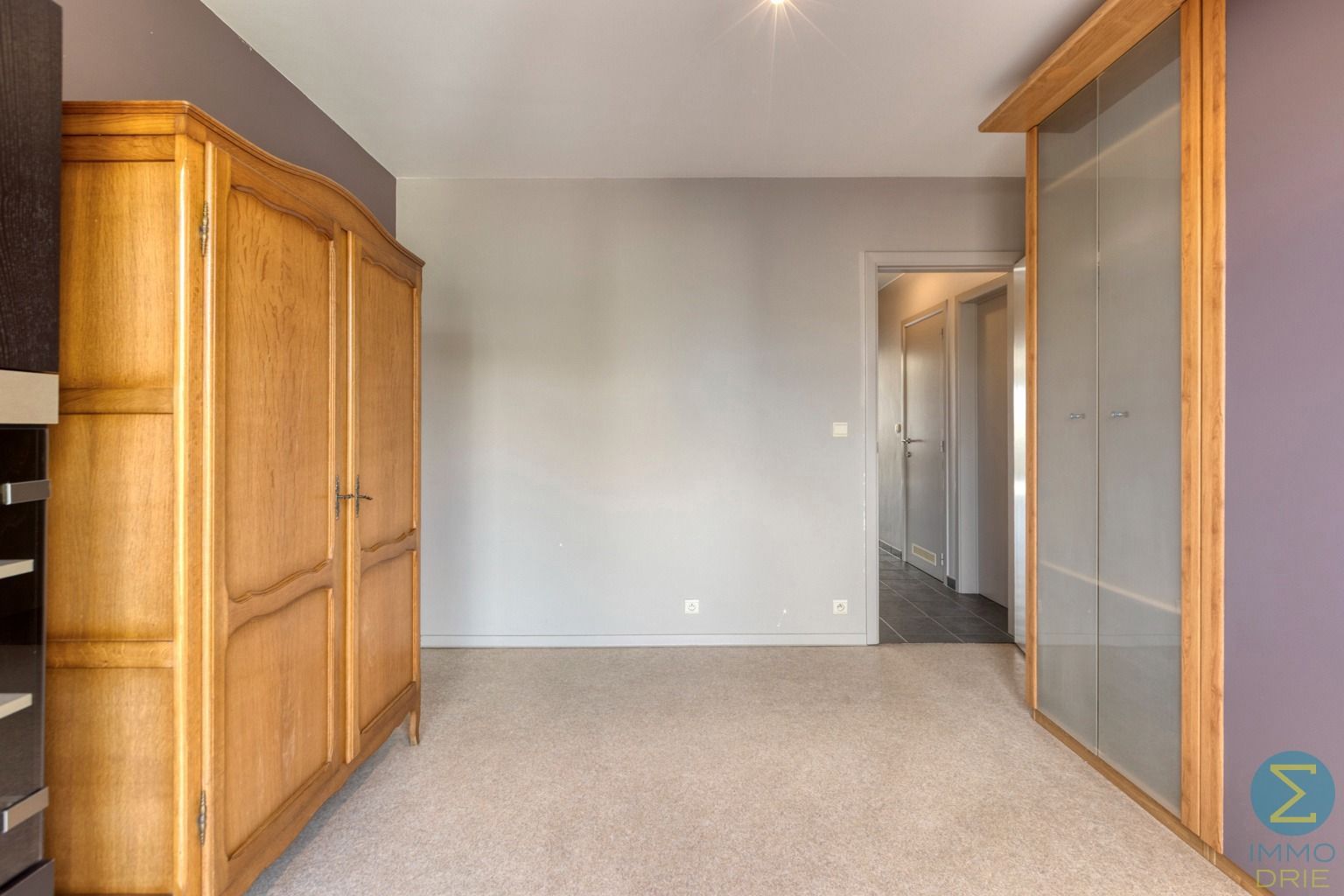 Ruim 2-slaapkamerappartement met balkon, garage én kelder  foto 13