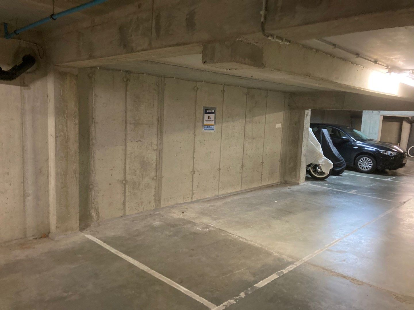 Ondergrondse parkeerplaats op -1 foto {{pictureIndex}}