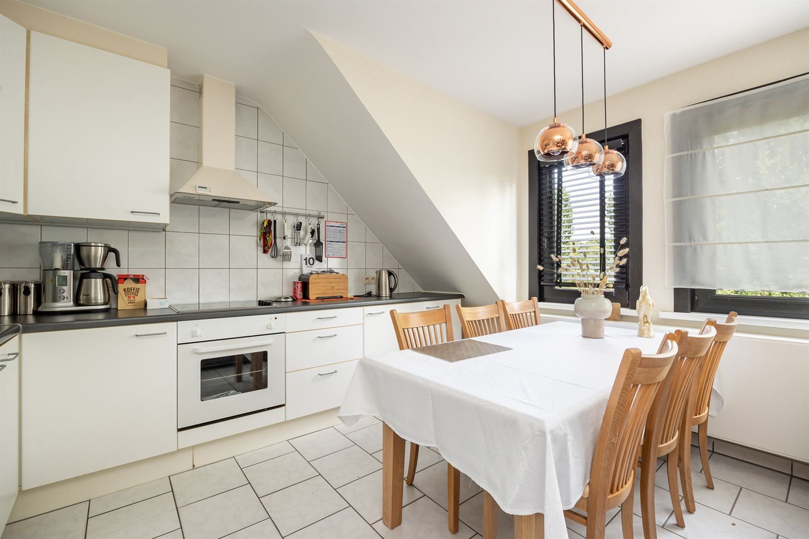 Gerenoveerd studio-appartement met zolder foto 4