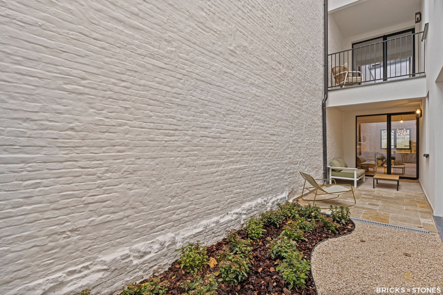 Knap gerenoveerd gelijkvloers appartement met tuin foto 3
