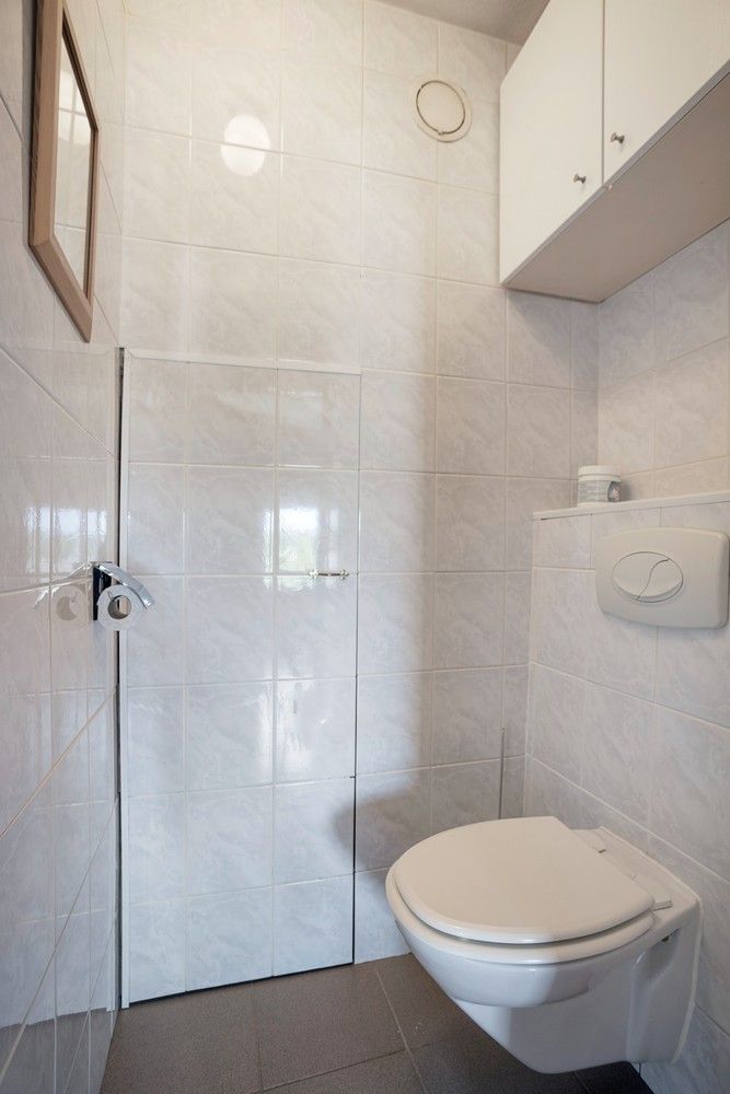 Ruim appartement met 3 slaapkamers en 3 terrassen op de bovenste verdieping in hartje Rekem ! foto 15