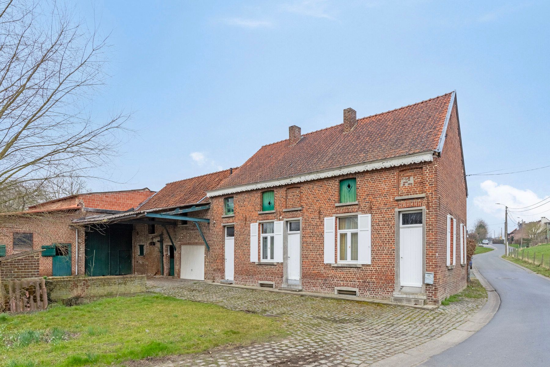 Authentieke hoeve + perceel bouwgrond foto 3