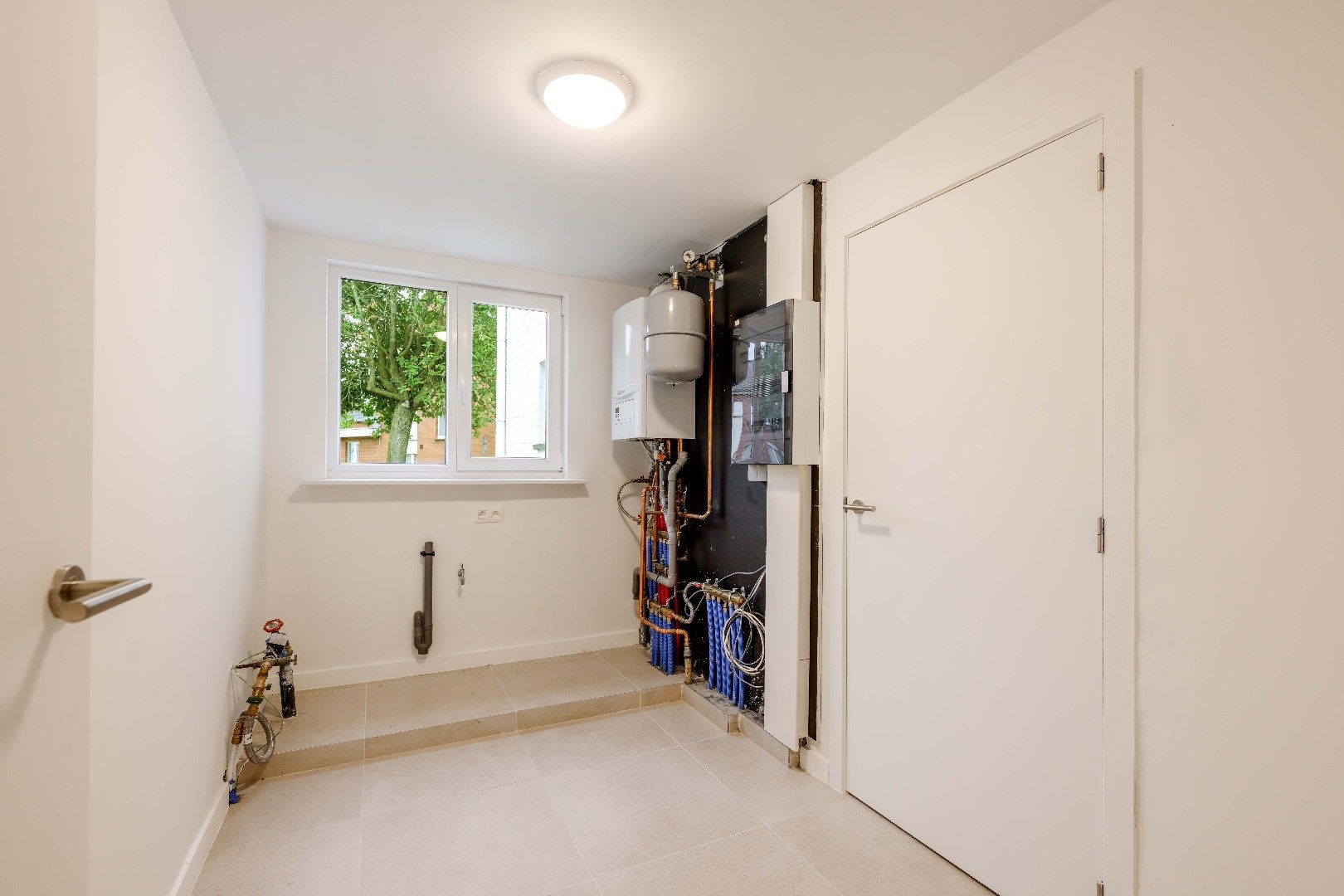 PERFECT INSTAPKLARE ENERGIEVRIENDELIJKE WONING MET TUIN EN GARAGE foto 11
