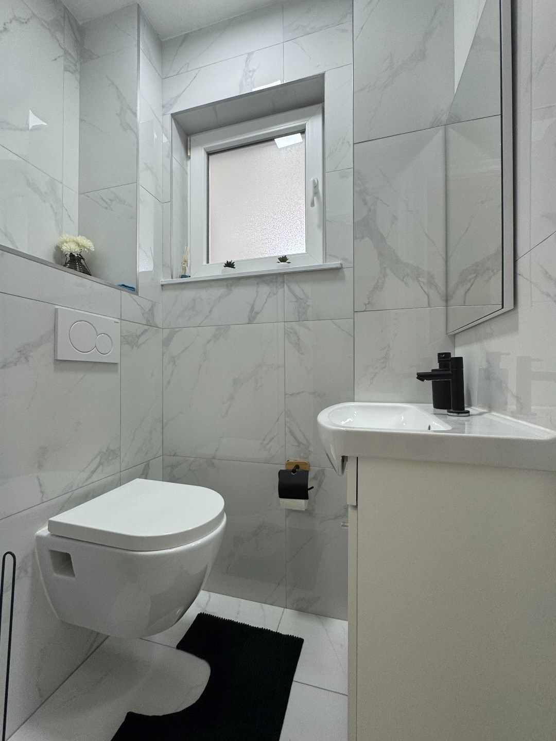 Licht en ruim 2-slaapkamerappartement te koop in Laken foto 26