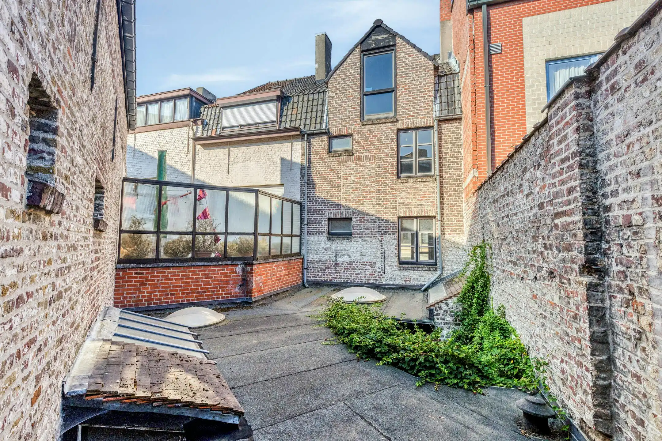 Verborgen parel met groene stadstuin te koop in hartje Kortrijk! foto 13