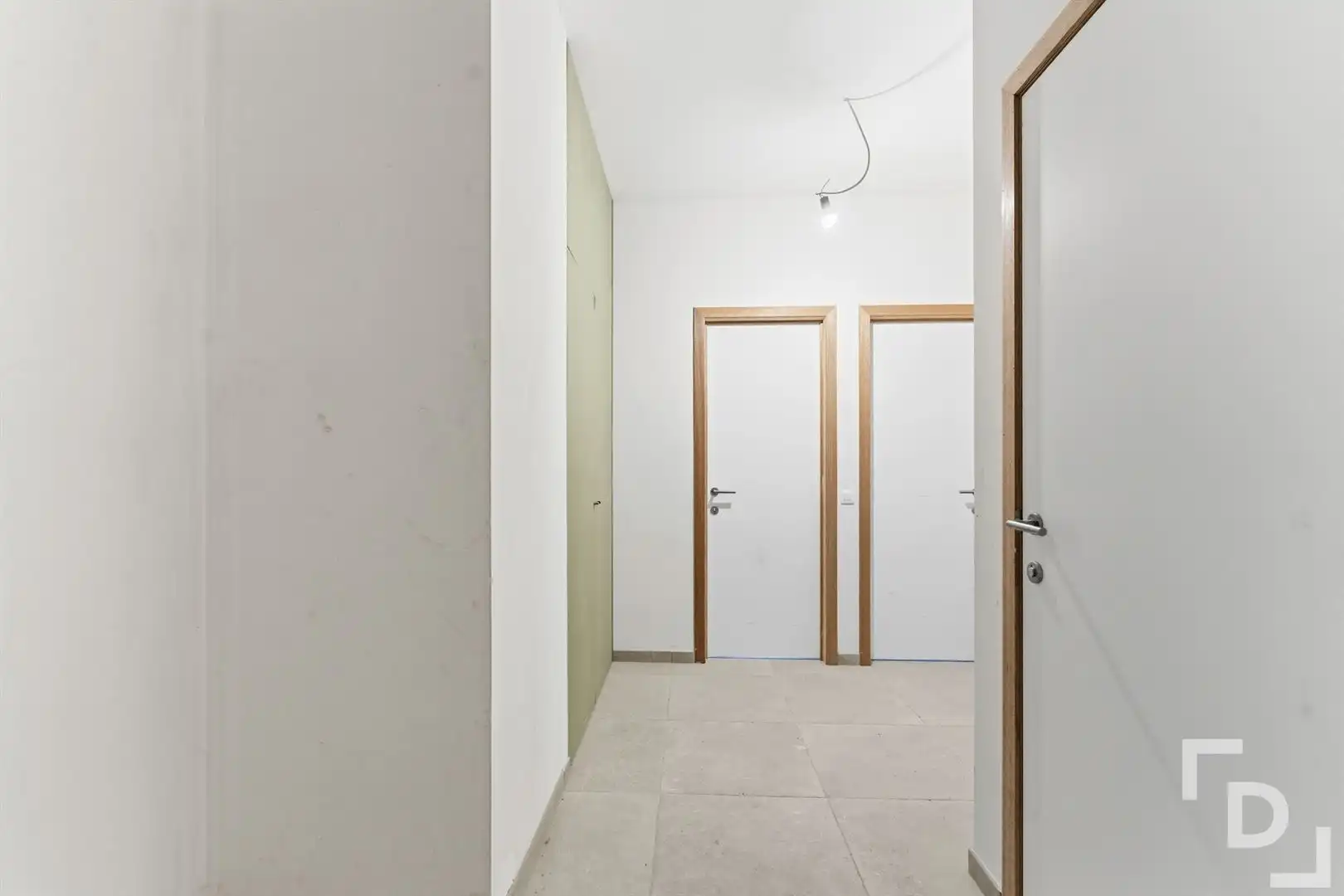 Nieuwbouwappartement met terras en tuin te koop in centrum Ieper. foto 15