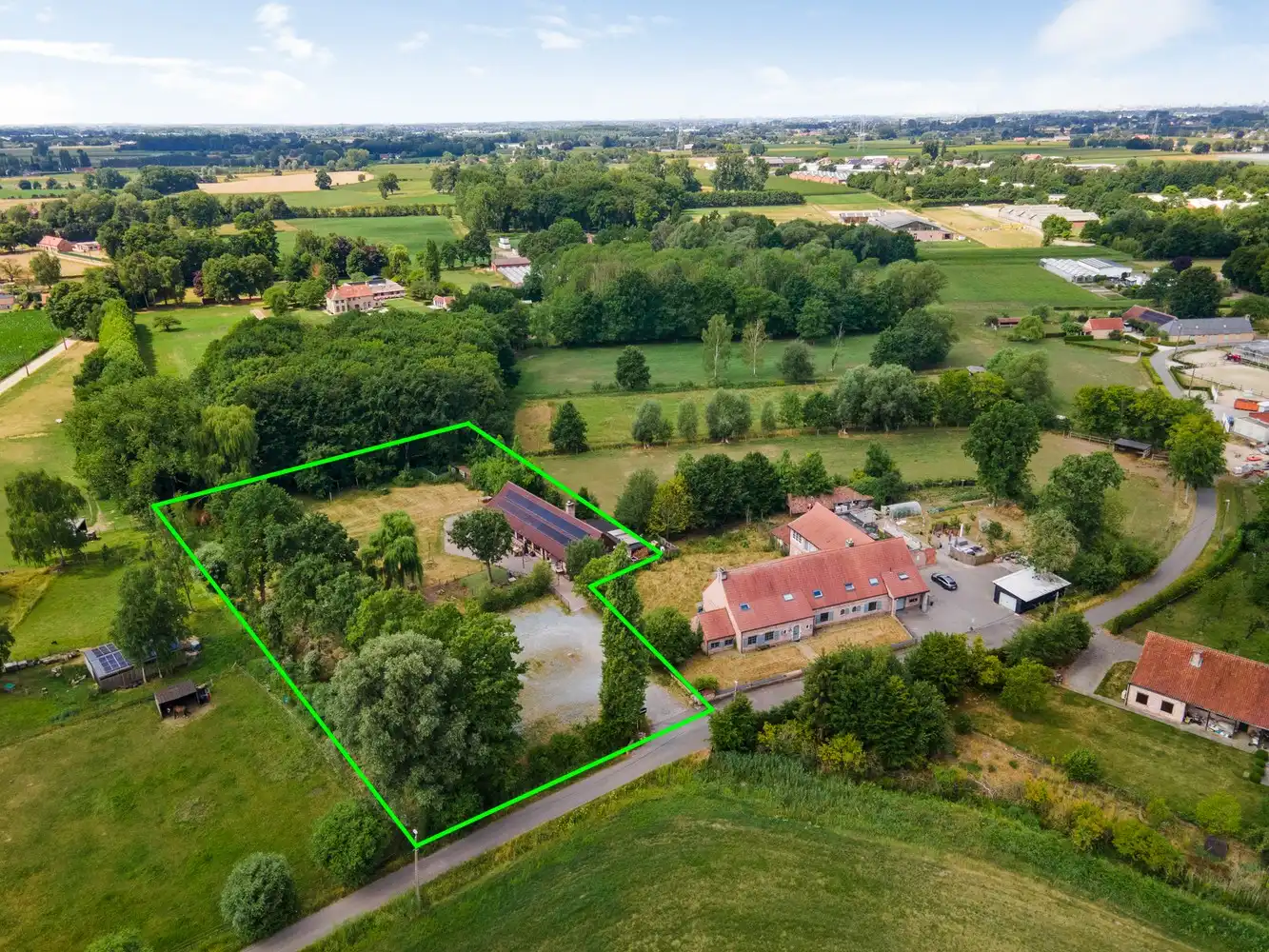 Landbouwgrond met gebouw op toplocatie in Emblem! foto 18