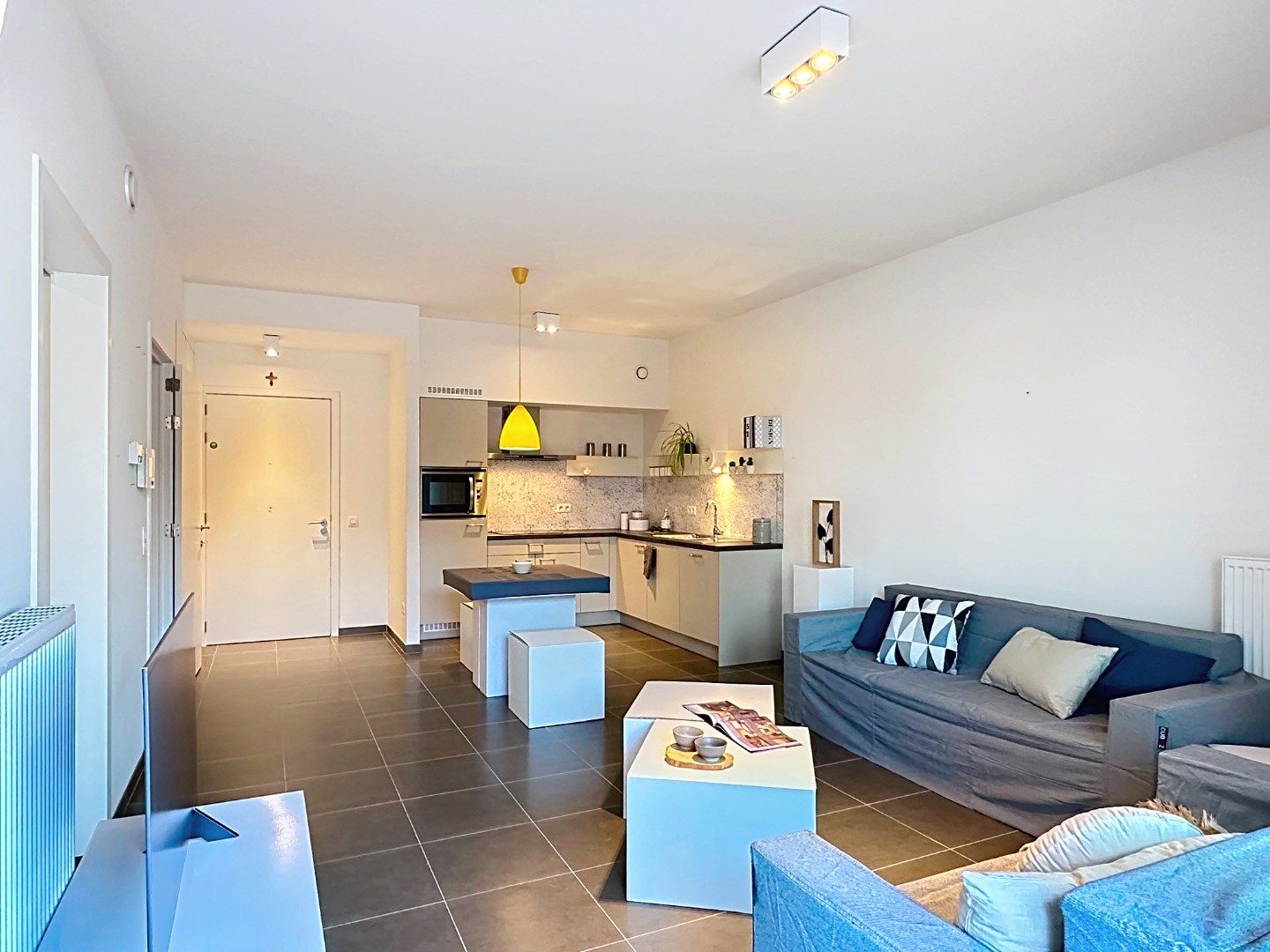 Stijlvol gelijkvloers appartement met gemeenschappelijke tuin foto 2