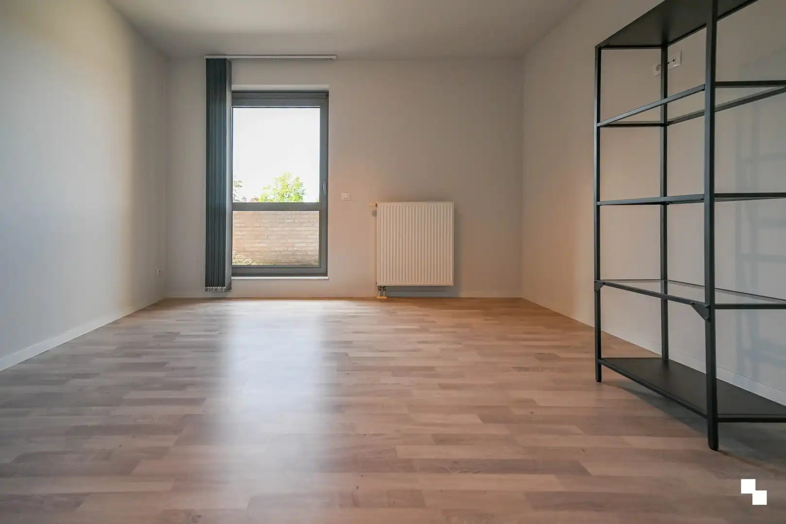 Ruim appartement met drie slaapkamers & garagebox foto 16