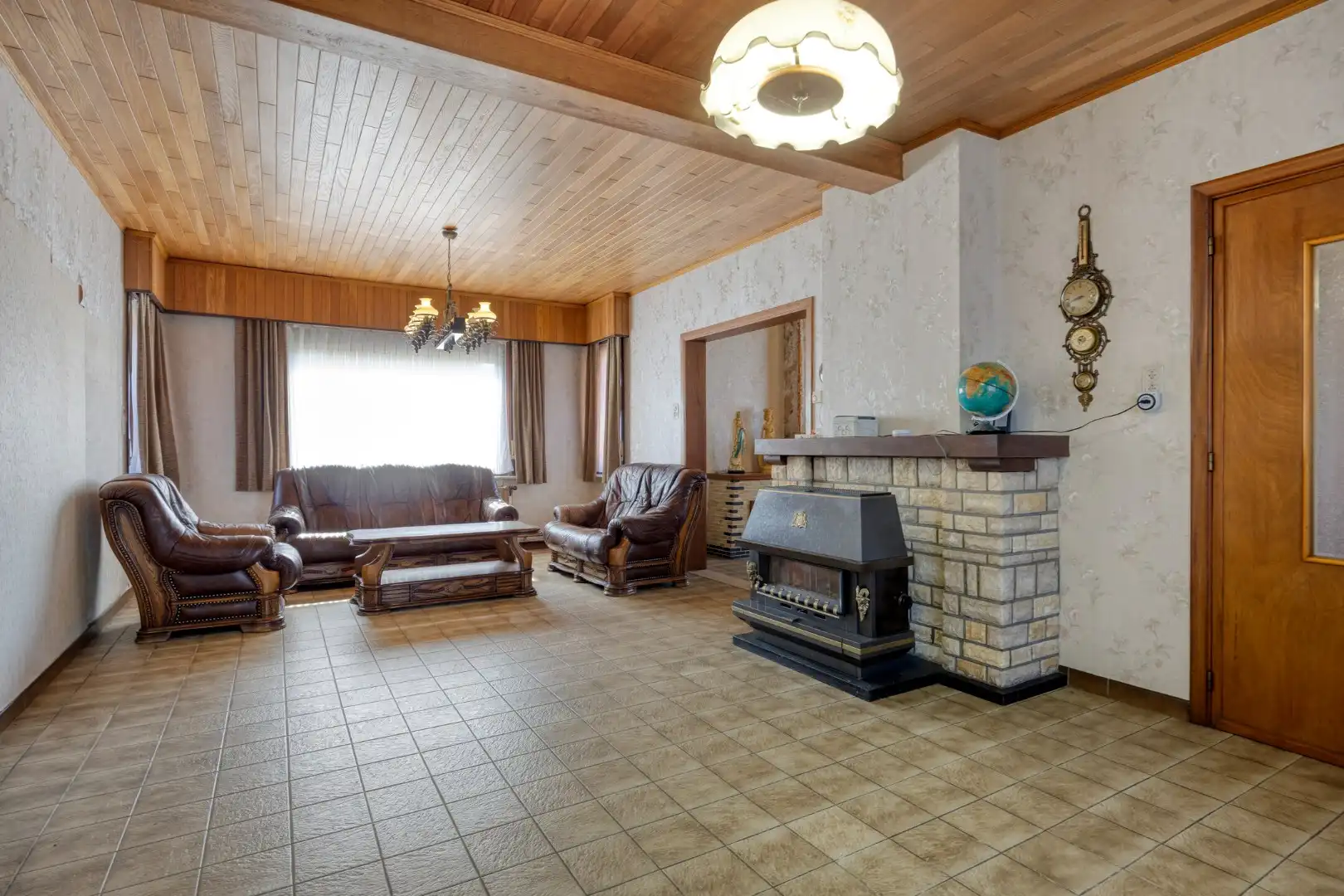 Ruime te renoveren woning met uitbreidingspotentieel en zonnig perceel van 1.738 m² !  foto 4