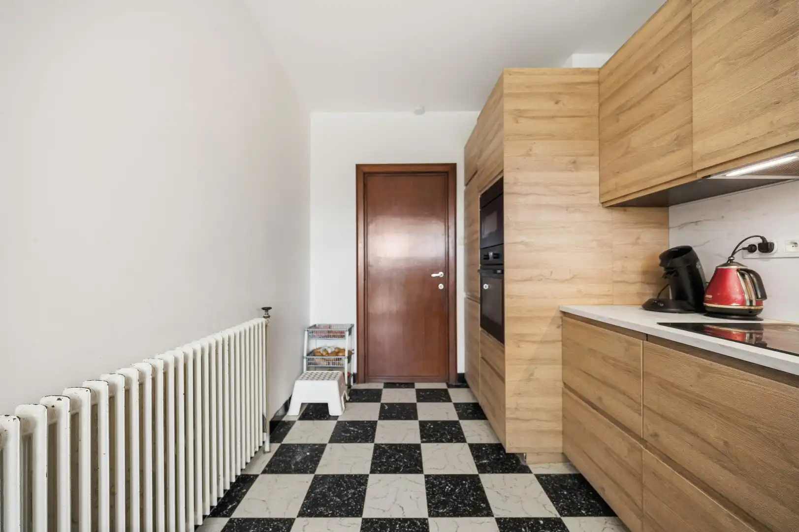 Instapklare rijwoning in een rustige straat te Tienen foto 11