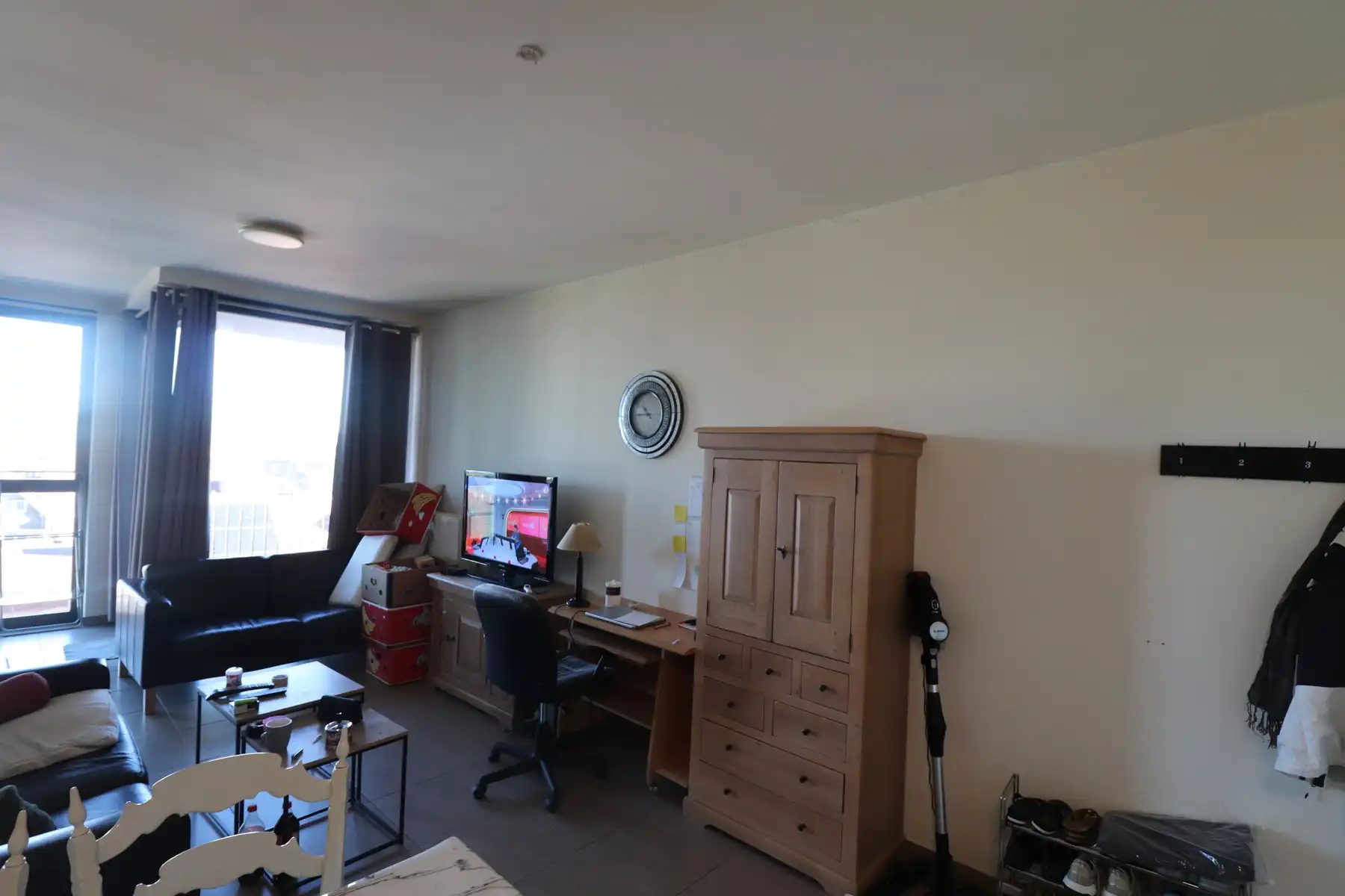 Studio op de dakverdieping met lift,  terras en kelderberging. foto 3