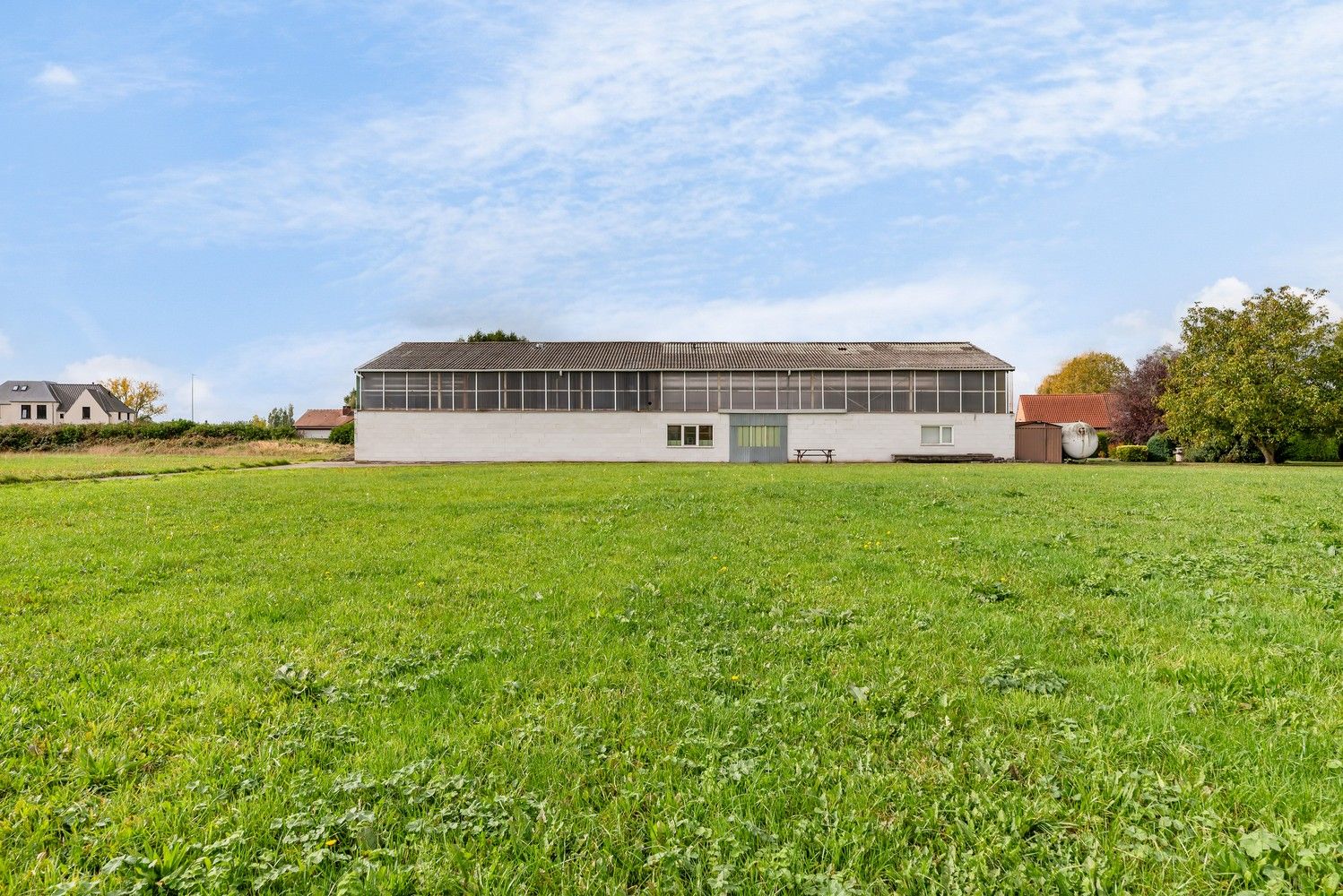 Ruime open bebouwing met loods en garages op ca. 1,7 ha – landelijke ligging in agrarisch gebied. foto 29