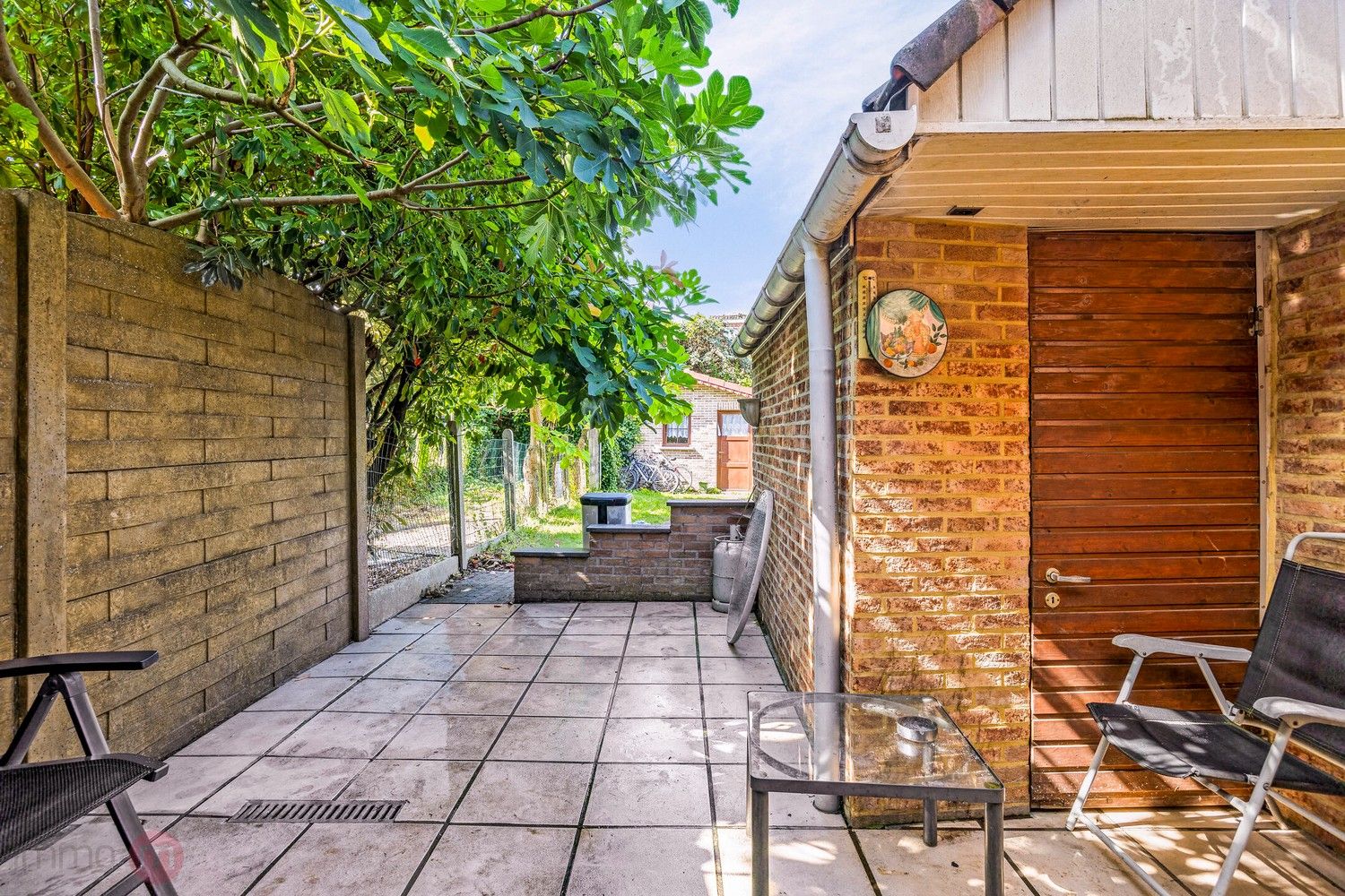 Charmante rijwoning met 3 slaapkamers en leuke tuin. foto 23