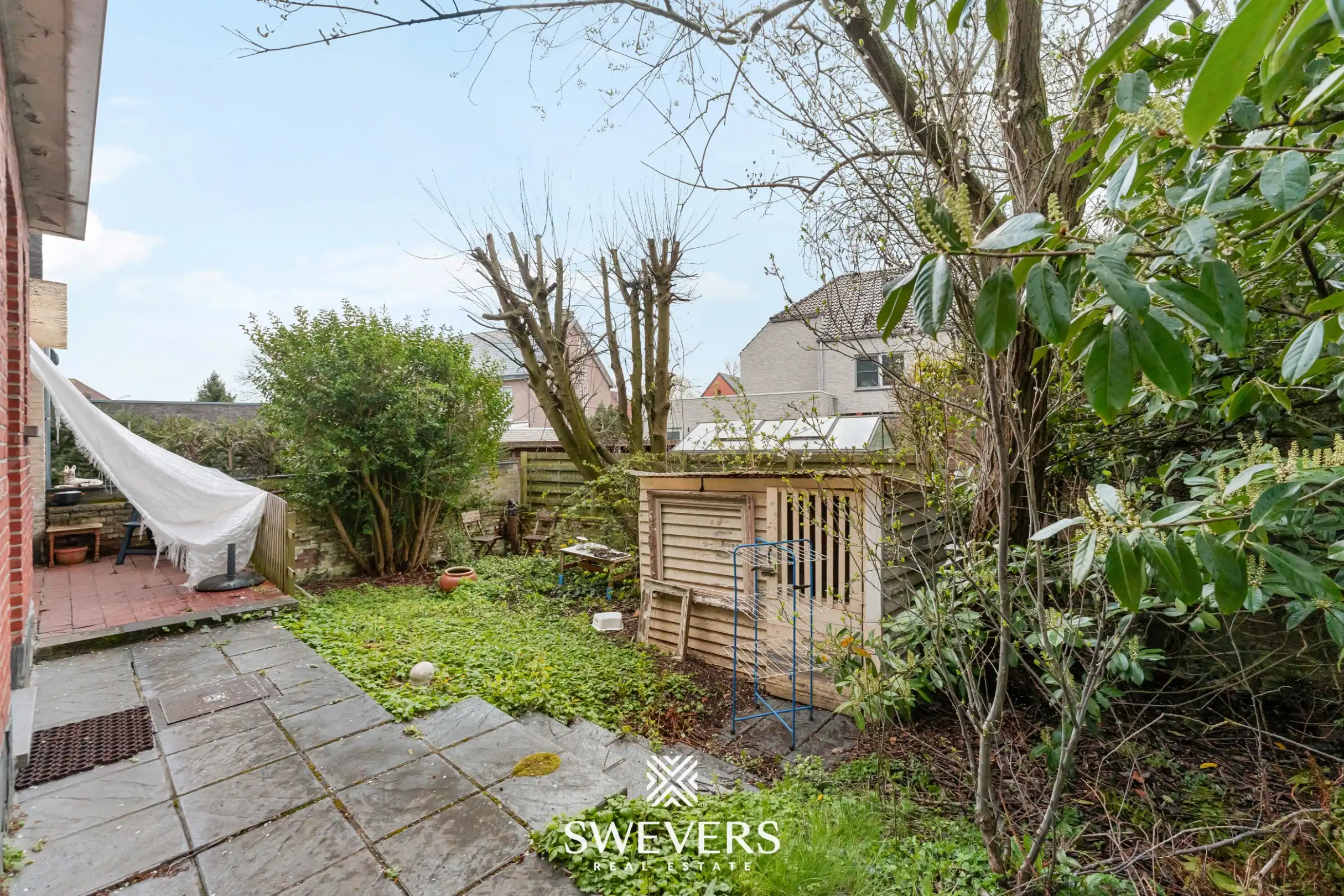 Ruime halfopen bebouwing met 4 slaapkamers en veel renovatiepotentieel op topligging in Hasselt foto 27