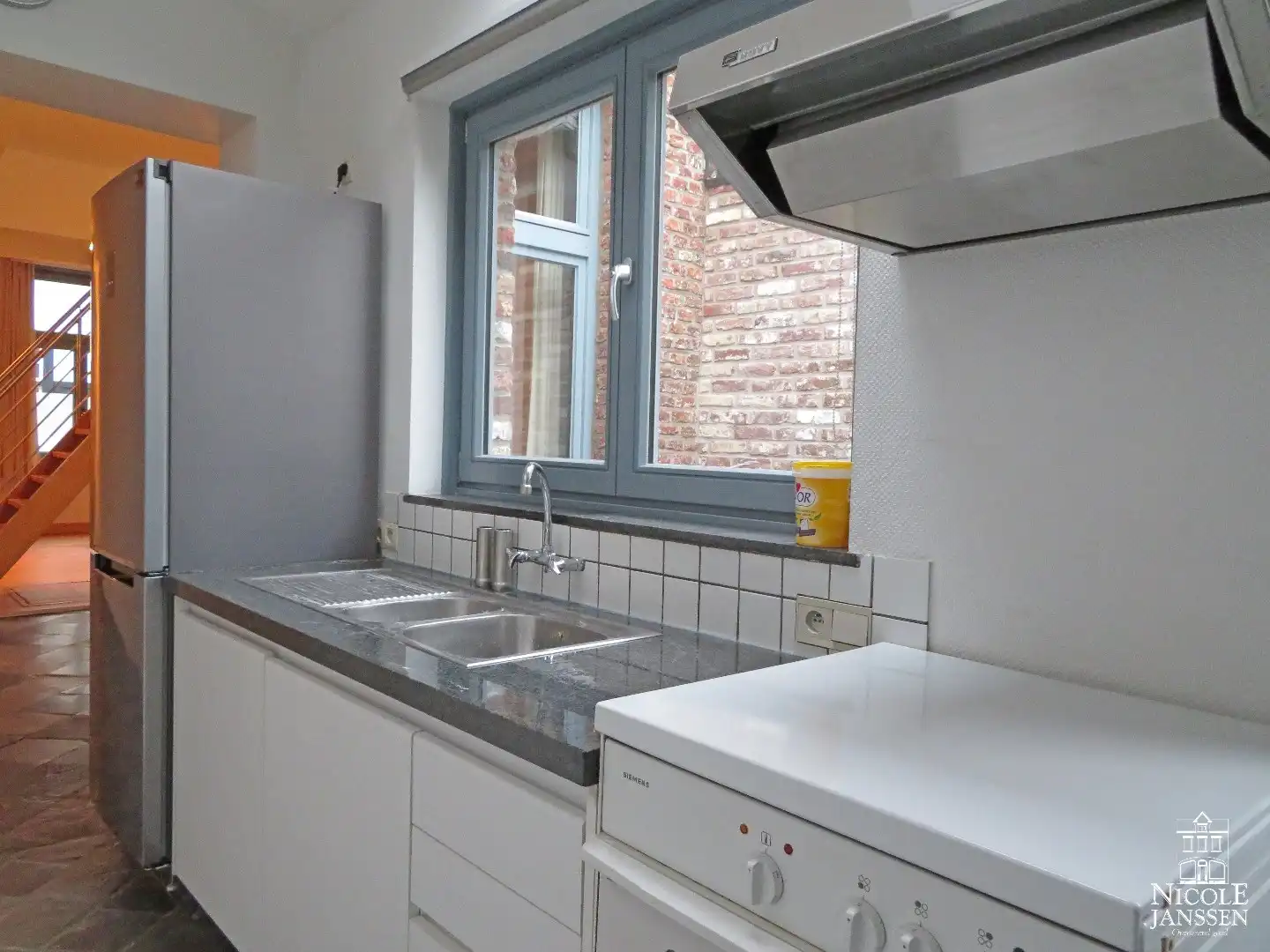 Charmant stadshuisje met drie slaapkamers en tuintje foto 6