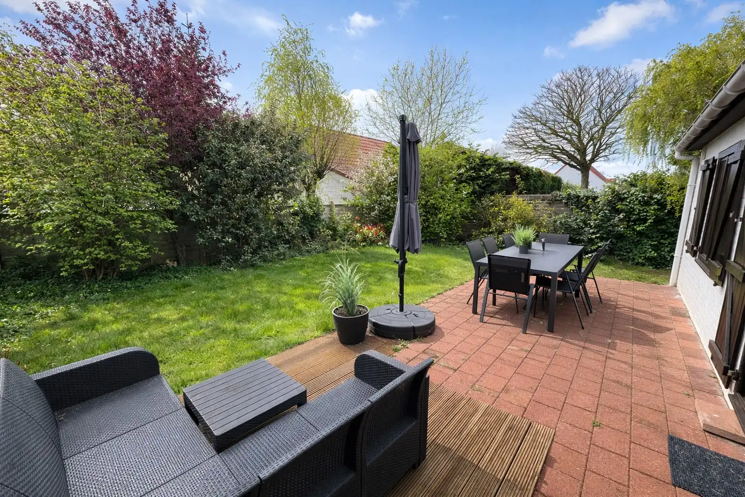 Charmante vakantiewoning met tuin en parking in rustige omgeving. foto 11