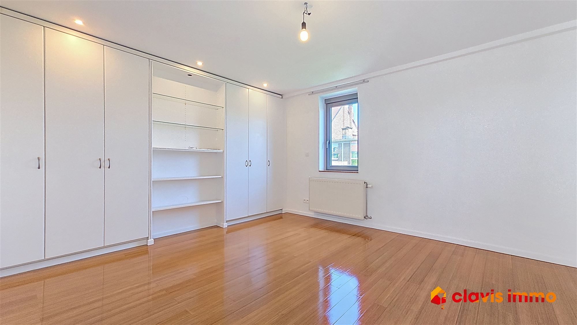 Volledig gerenoveerde woning met tuin foto 12