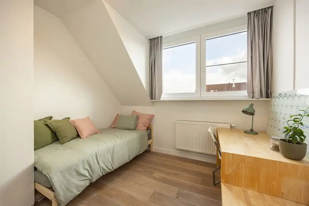 Luxe bel-etage in topbuurt op Linkeroever met heerlijke tuin foto 13