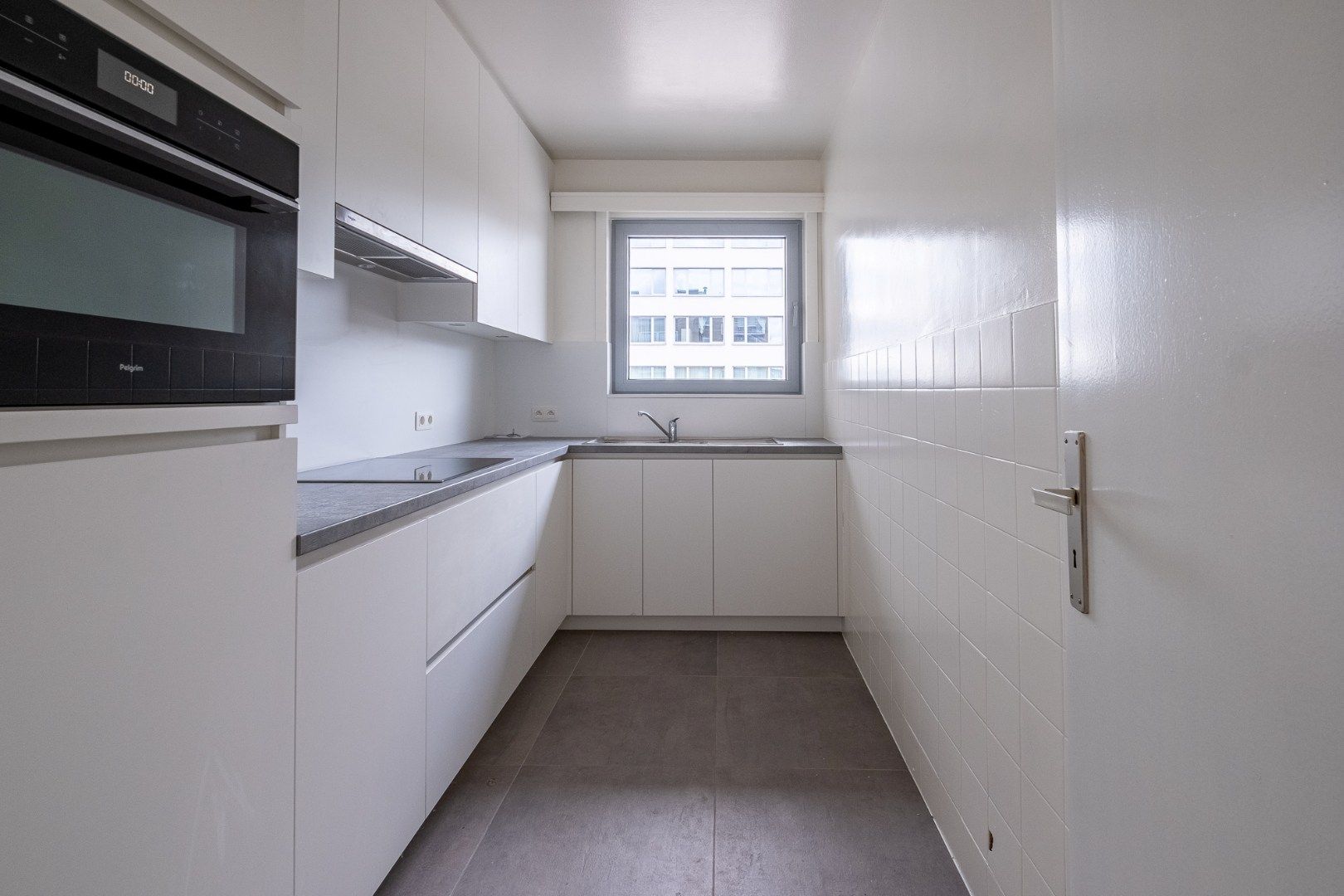 Ruim 3-slaapkamer appartement (95 m²) op de 1ste verdieping met lift aan centrum Beveren!  foto 9
