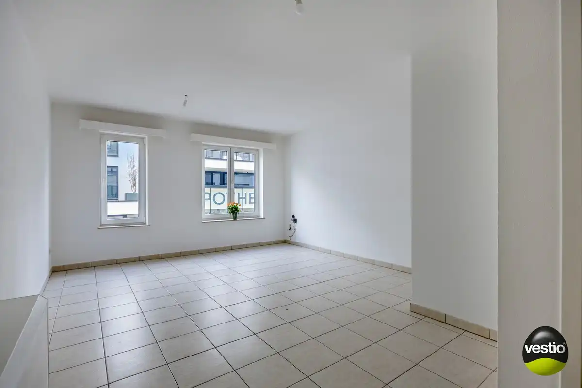 Instapklaar 1-slaapkamerappartement nabij centrum. foto {{pictureIndex}}