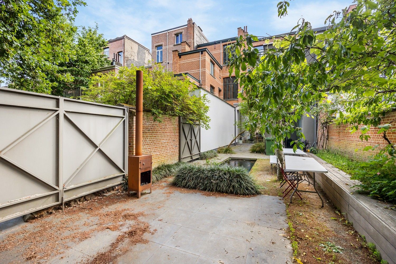 Eclectische herenhuis van ±325m² met mogelijks 5 slaapkamers en een tuin van liefst ±115m² te Zurenborg! foto 9