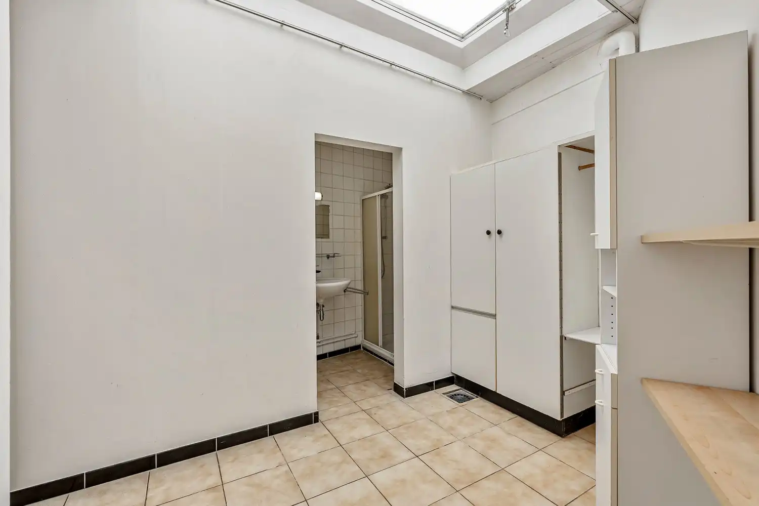 Goed gelegen rijwoning met 2 slaapkamers en een af te werken zolderruimte te Leuven! foto 7