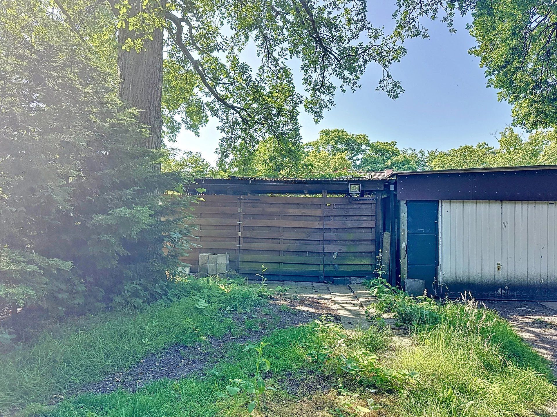 Super gezellige woning met groot terras, mooie bloementuin en carport. foto 18