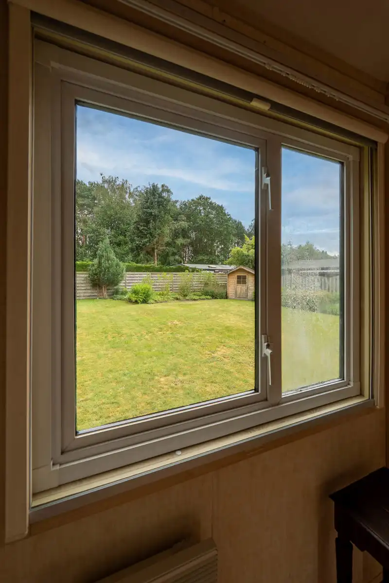 Prachtige agrarische tuin met caravan foto 15