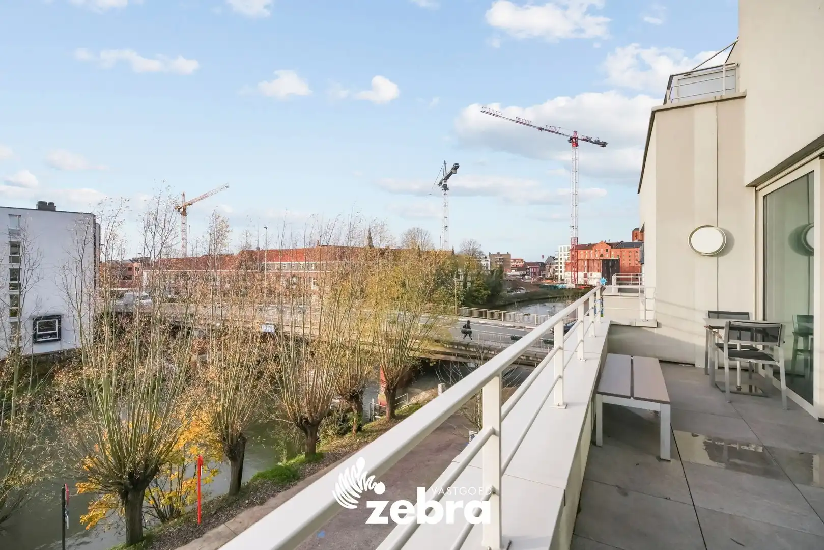 Moderne serviceflat met prachtig zicht op de Leie en autostaanplaats te Deinze! foto 16