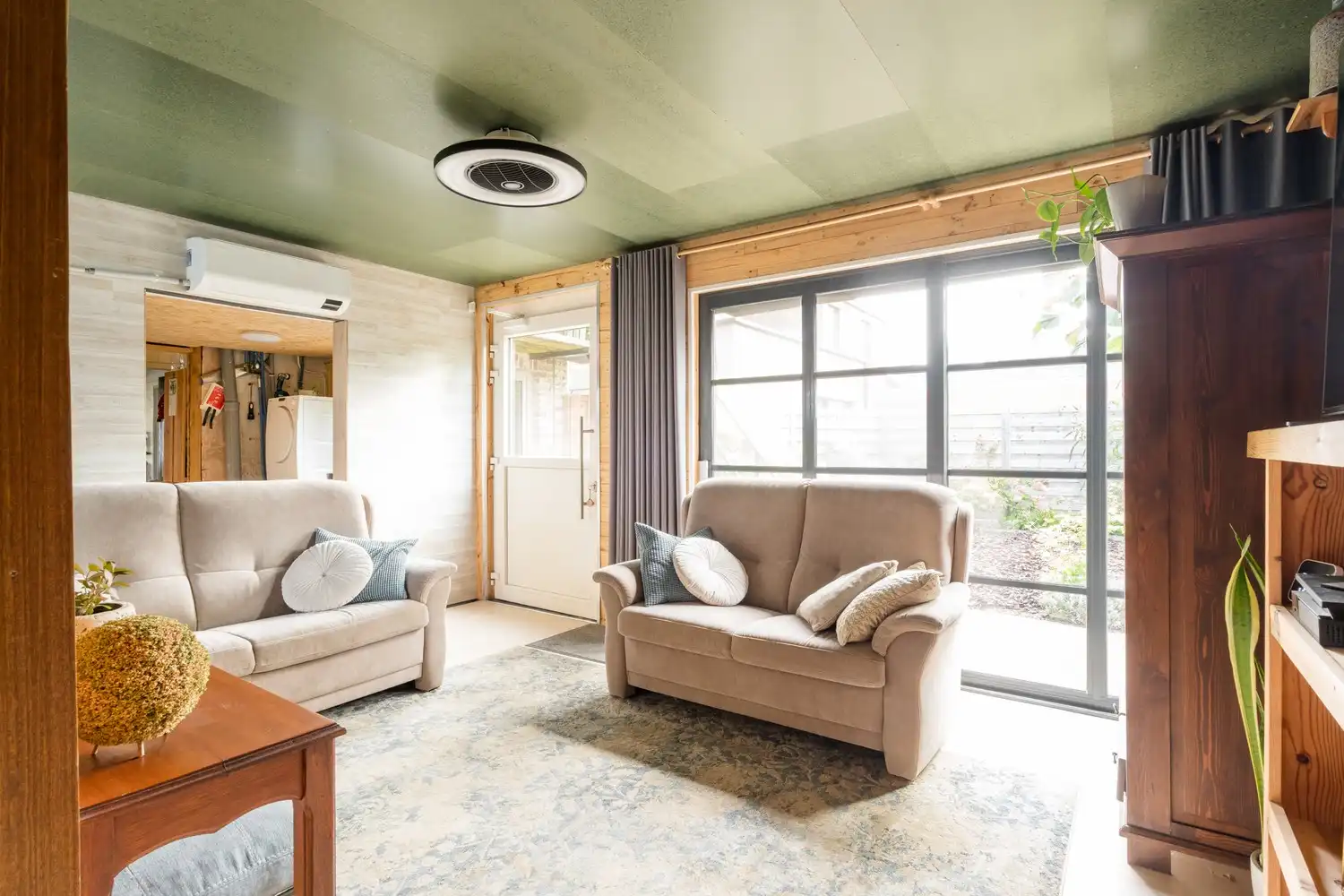 Veelzijdige woning met zorgmogelijkheden, werkruimte en tal van bijgebouwen foto 14
