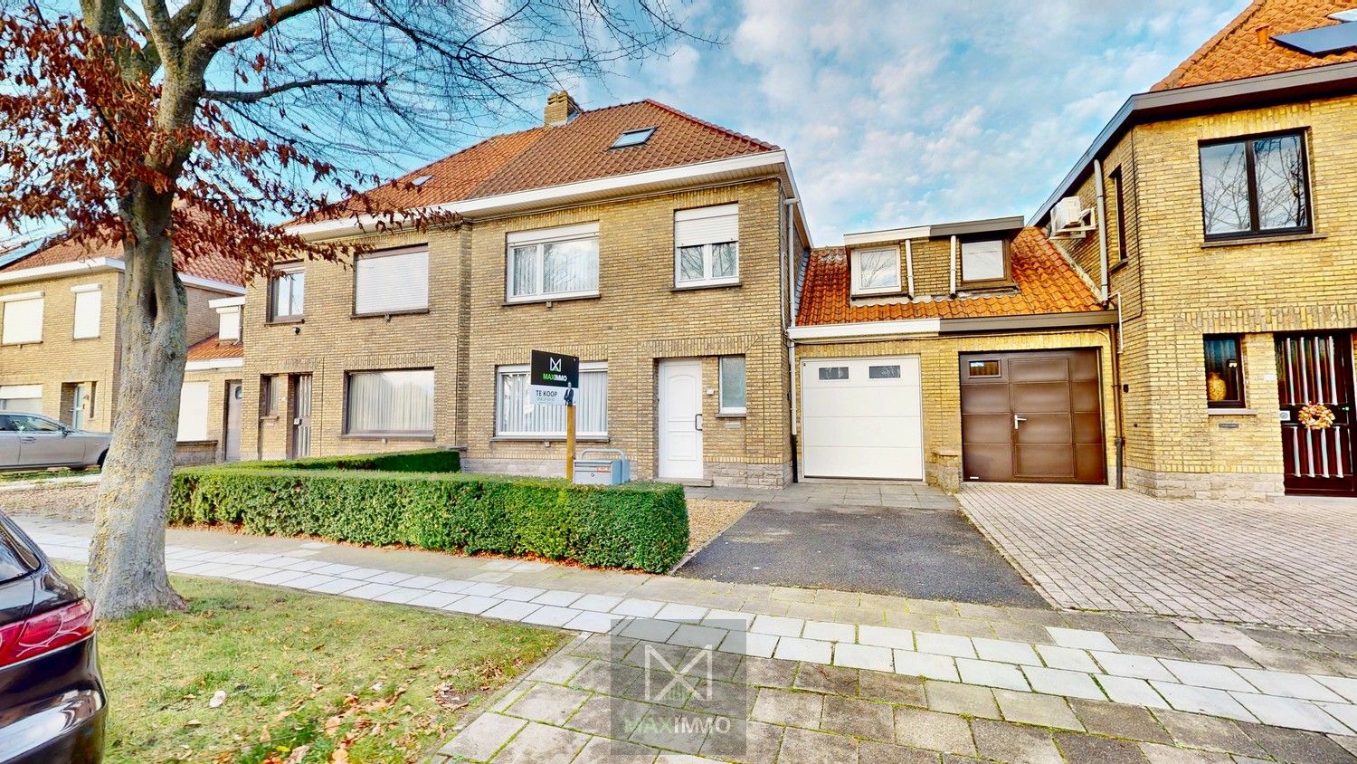 Hoofdfoto van de publicatie: Te renoveren woning met tuin, garage en uitbreidingsmogelijkheden nabij centrum en Leie