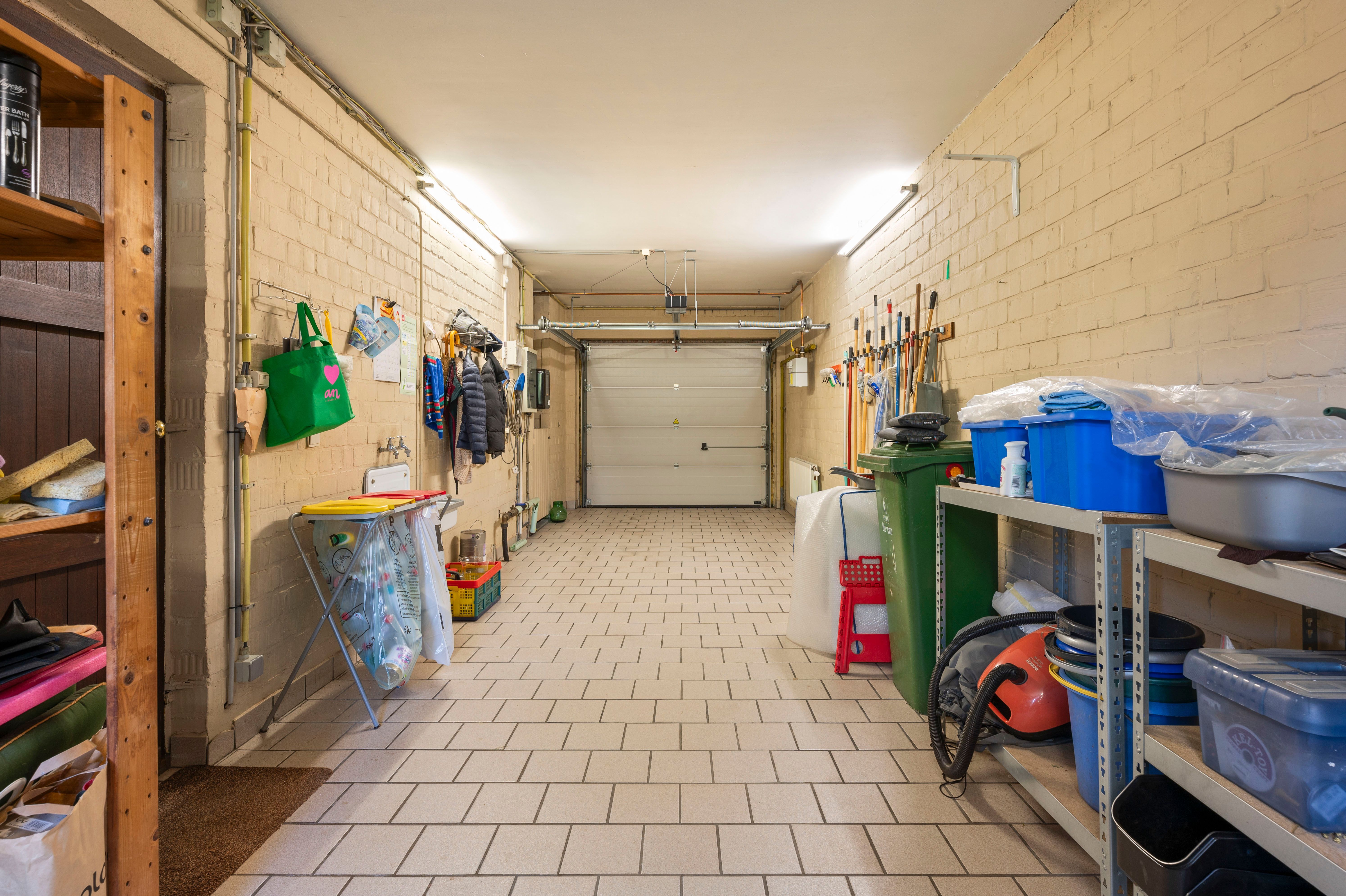 Instapklare gezinswoning met prachtige tuin en veranda in hartje Ekeren foto 12