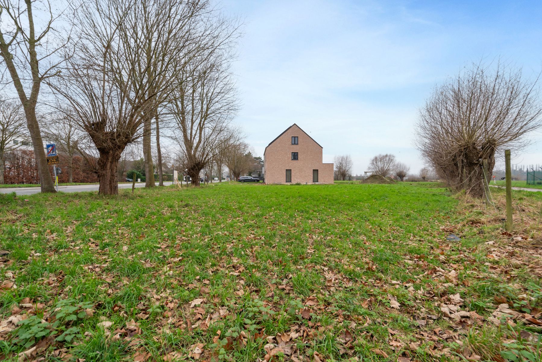 Rustig gelegen villagrond te Buggenhout (1.130 m²) foto {{pictureIndex}}