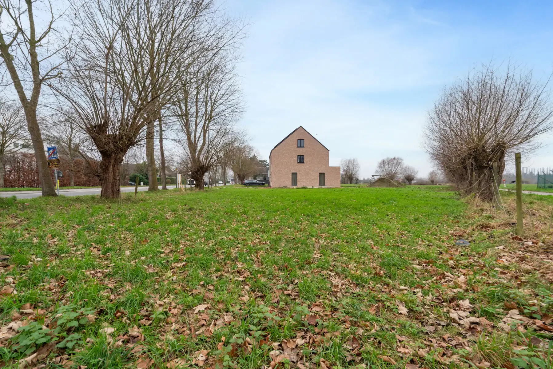 Rustig gelegen villagrond te Buggenhout (1.130 m²) foto {{pictureIndex}}