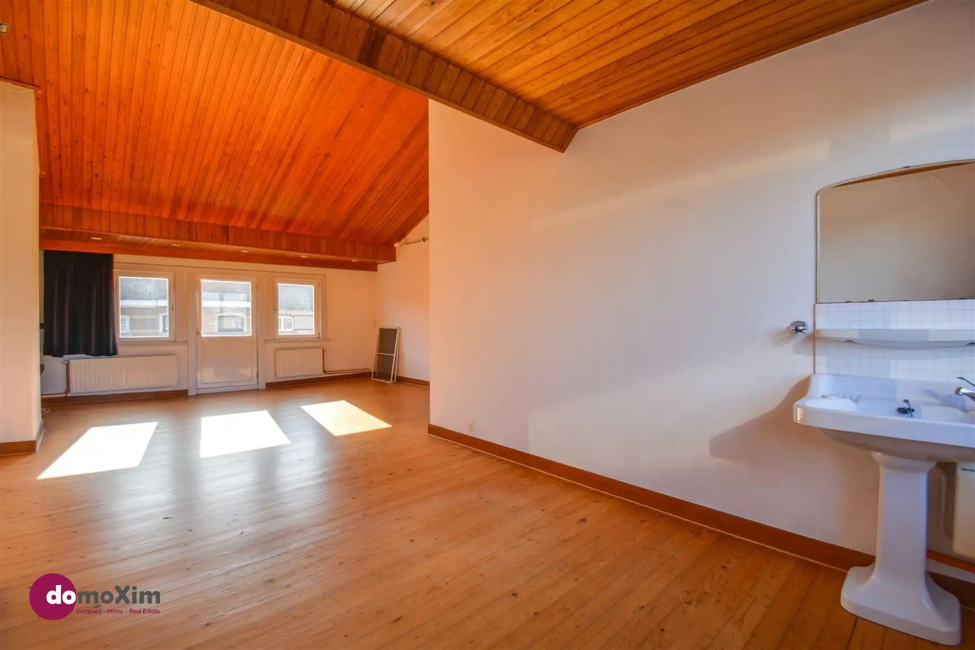 Ruime, karaktervolle stadswoning met twee garageboxen en tuin in Mechelen foto 23