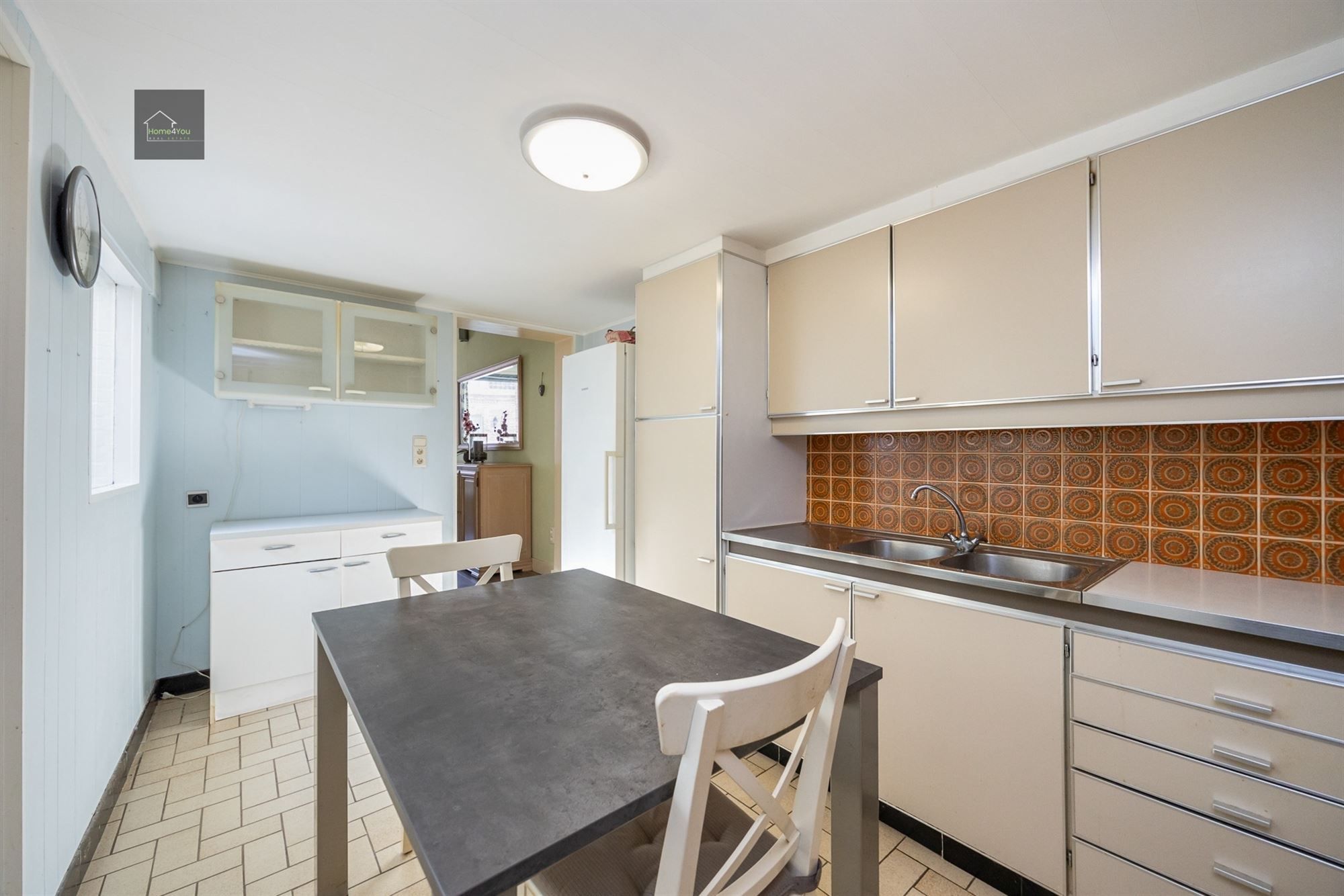 Te renoveren rijwoning met tuintje foto 5
