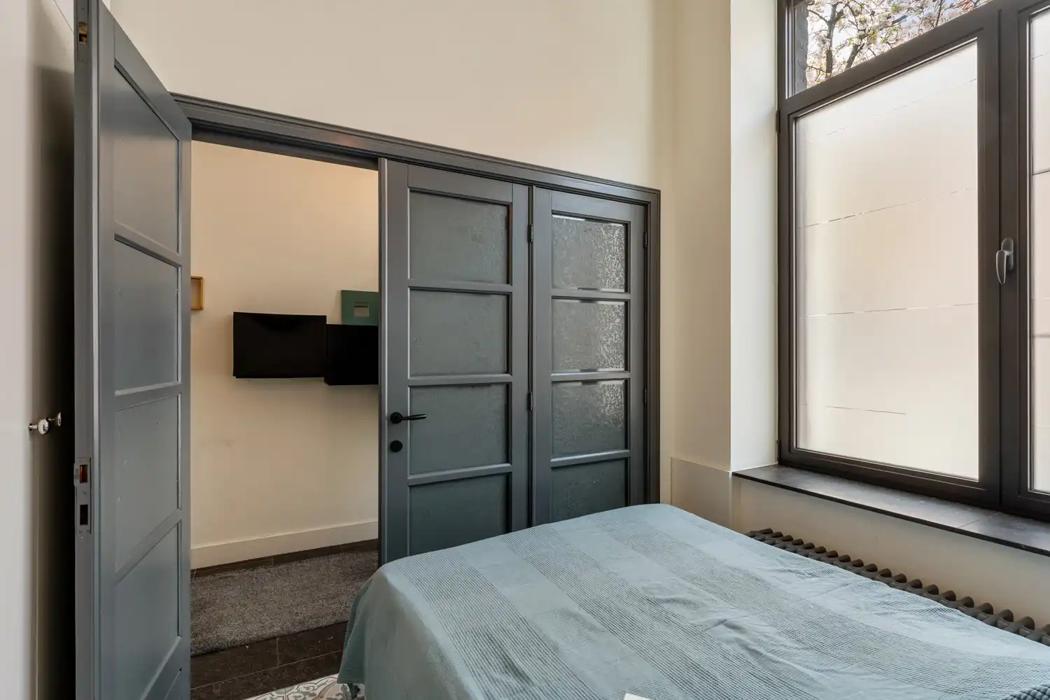 Gerenoveerde en energiezuinige woning met 4 slaapkamers en een tuin met een achteruitgang en een grote garage te centrum Leuven! foto 19