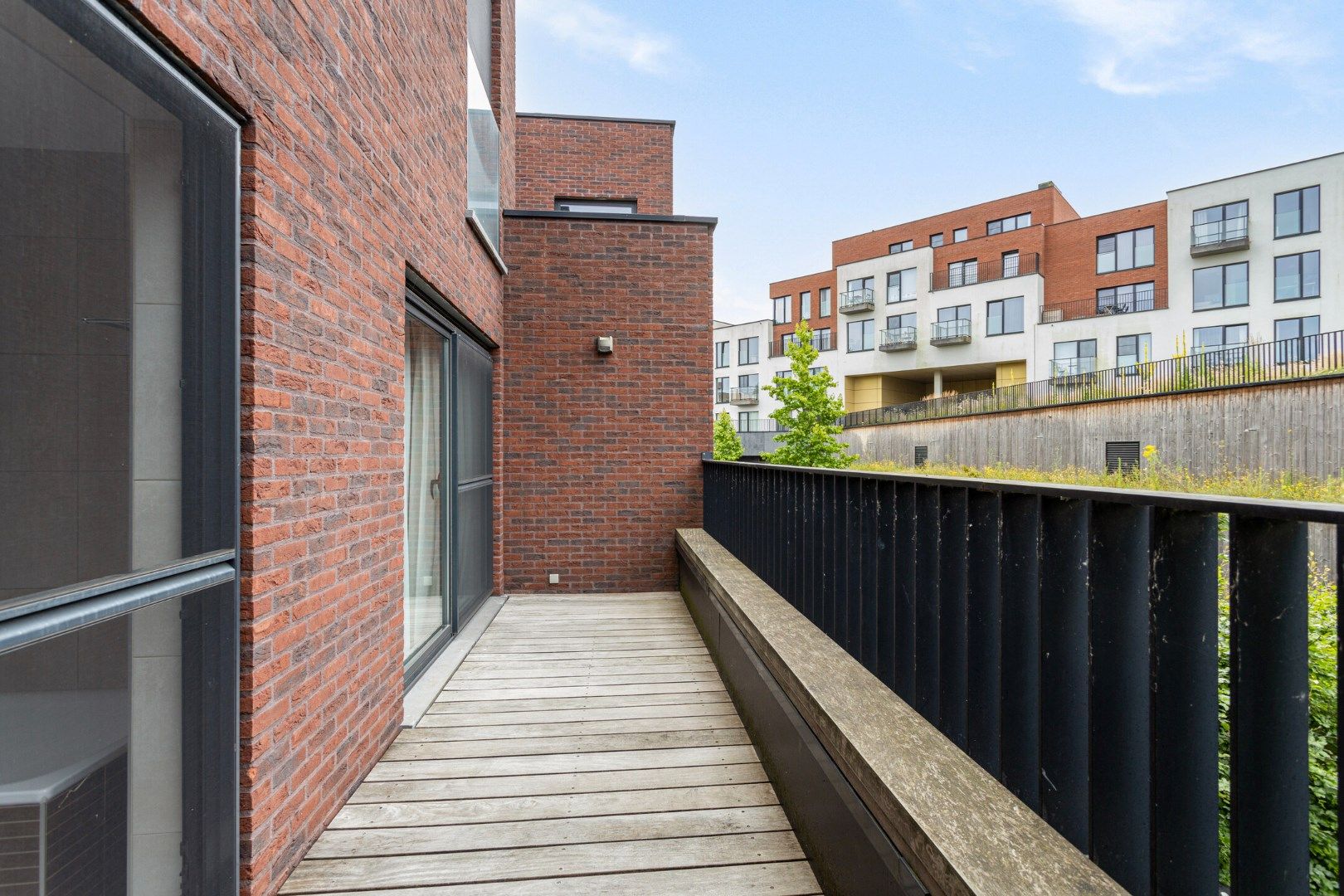 Halfopen bebouwing met vier slaapkamers en tuin in Gent foto 11